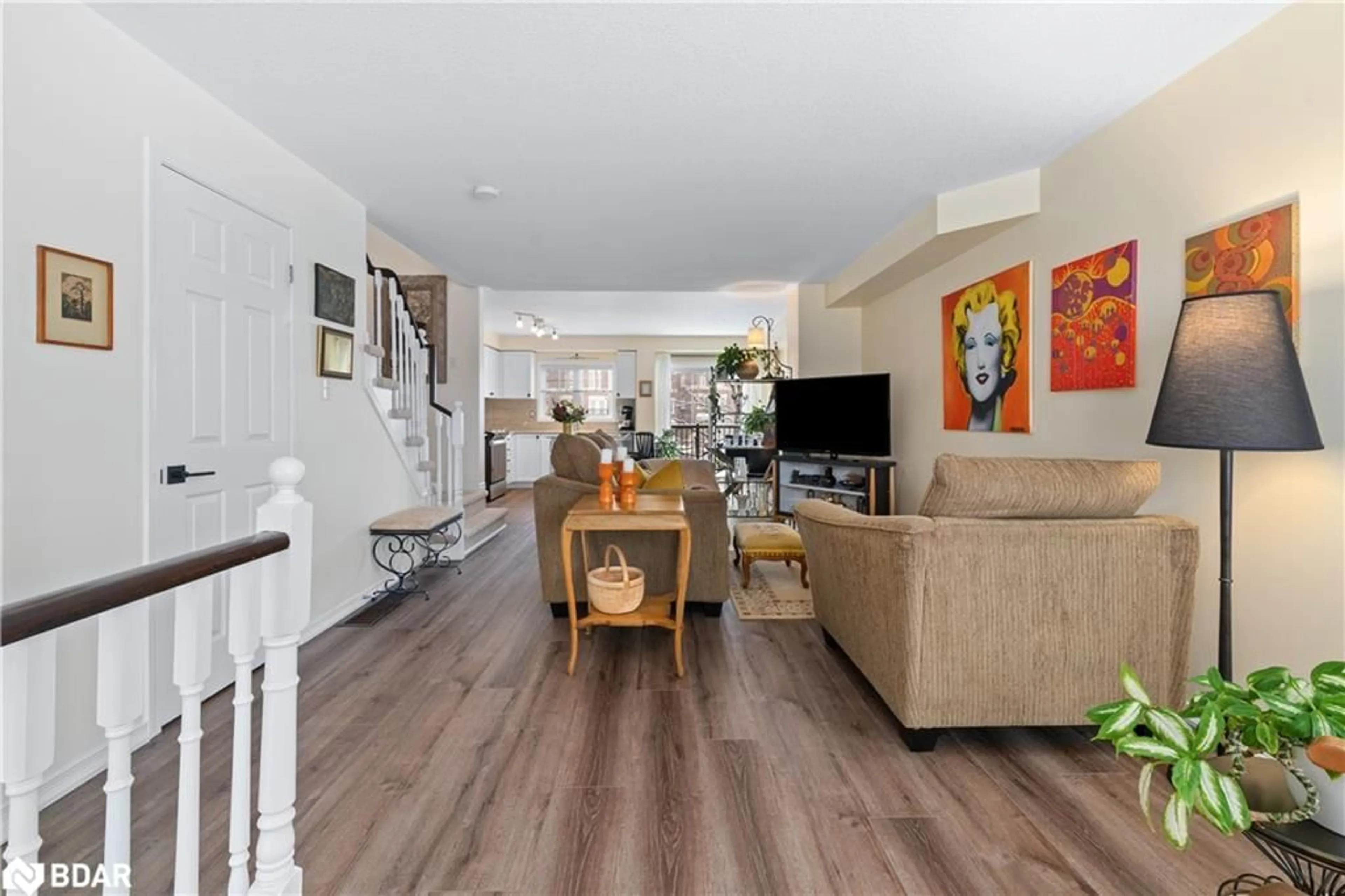 Living room with furniture, wood/laminate floor for 571 Longworth Ave #13, Bowmanville Ontario L1C 0H3