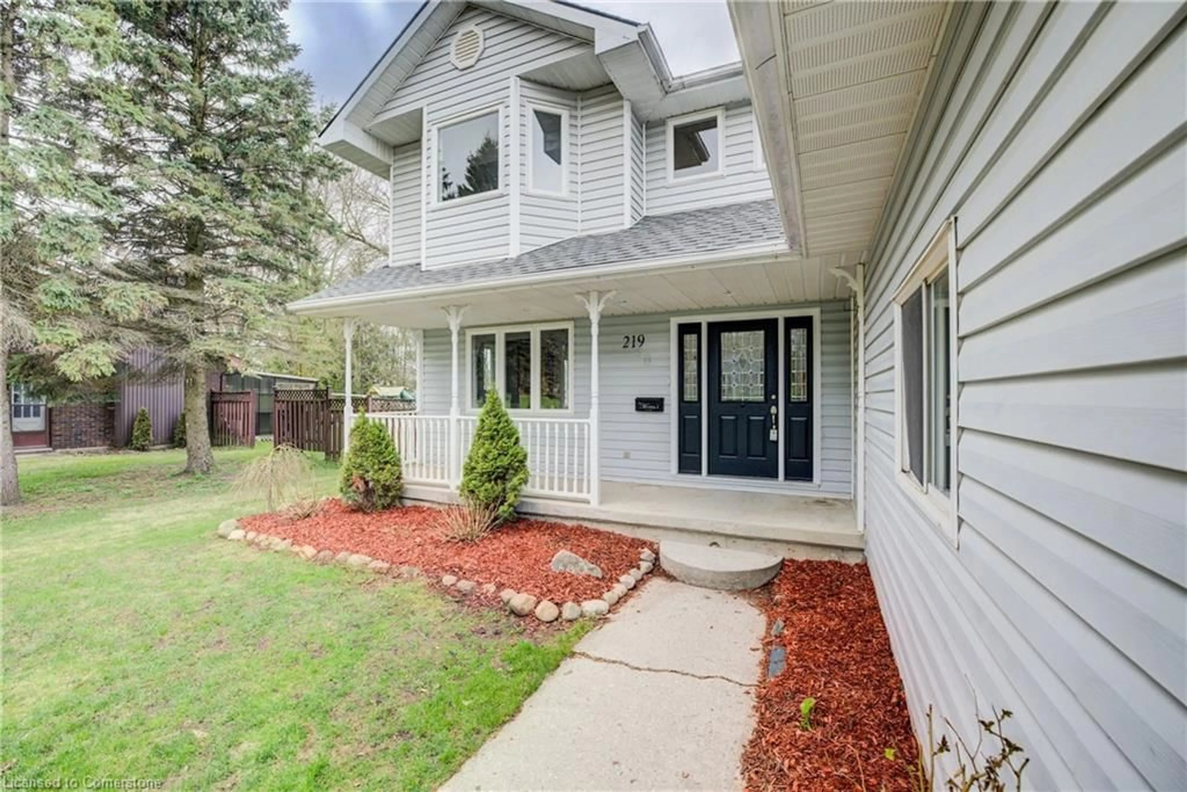 Home with vinyl exterior material, street for 219 Henry Lane, Palmerston Ontario N0G 2P0