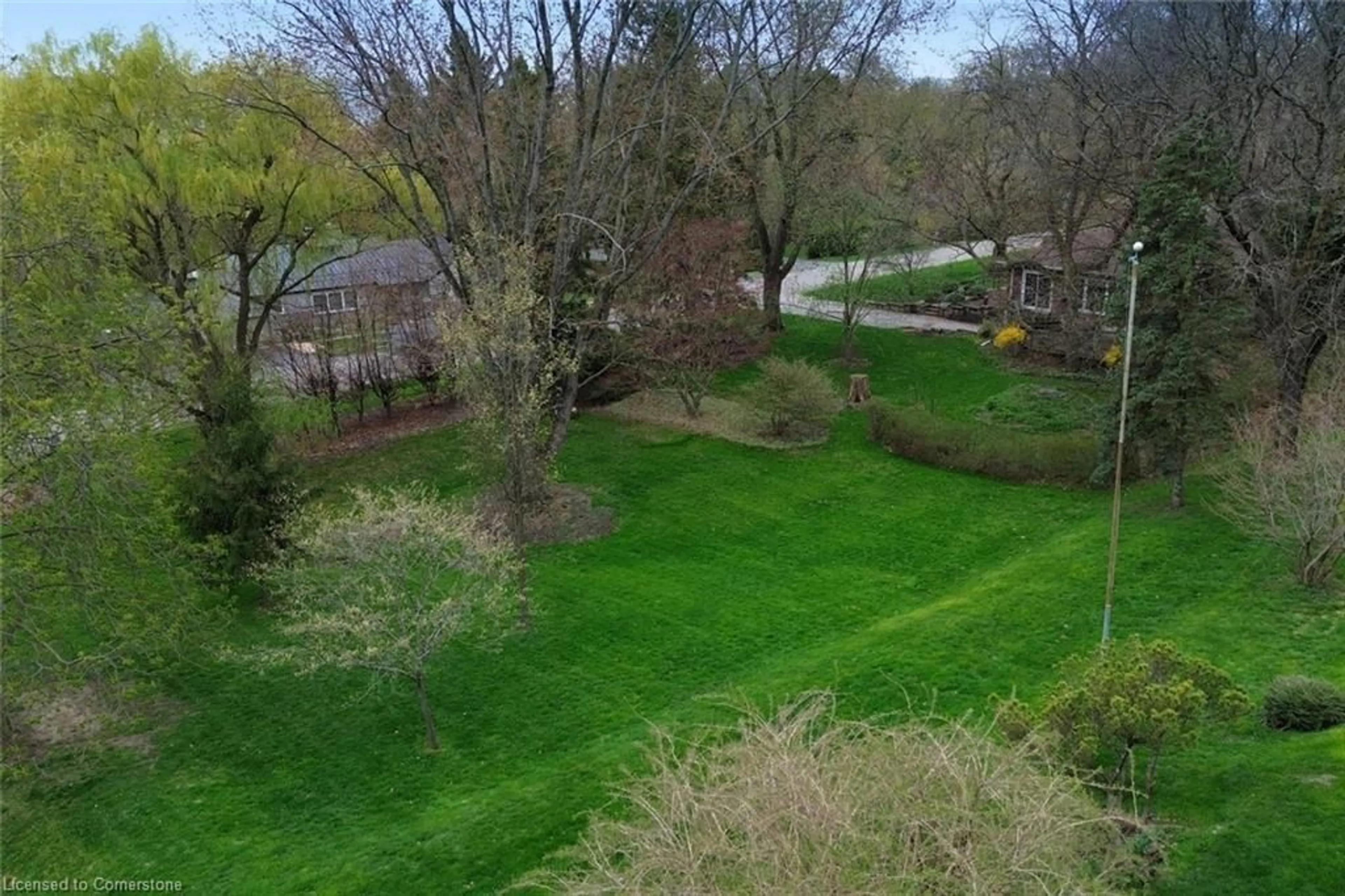 A pic from outside/outdoor area/front of a property/back of a property/a pic from drone, forest/trees view for 4 Sun Ave, Dundas Ontario L9H 5A5