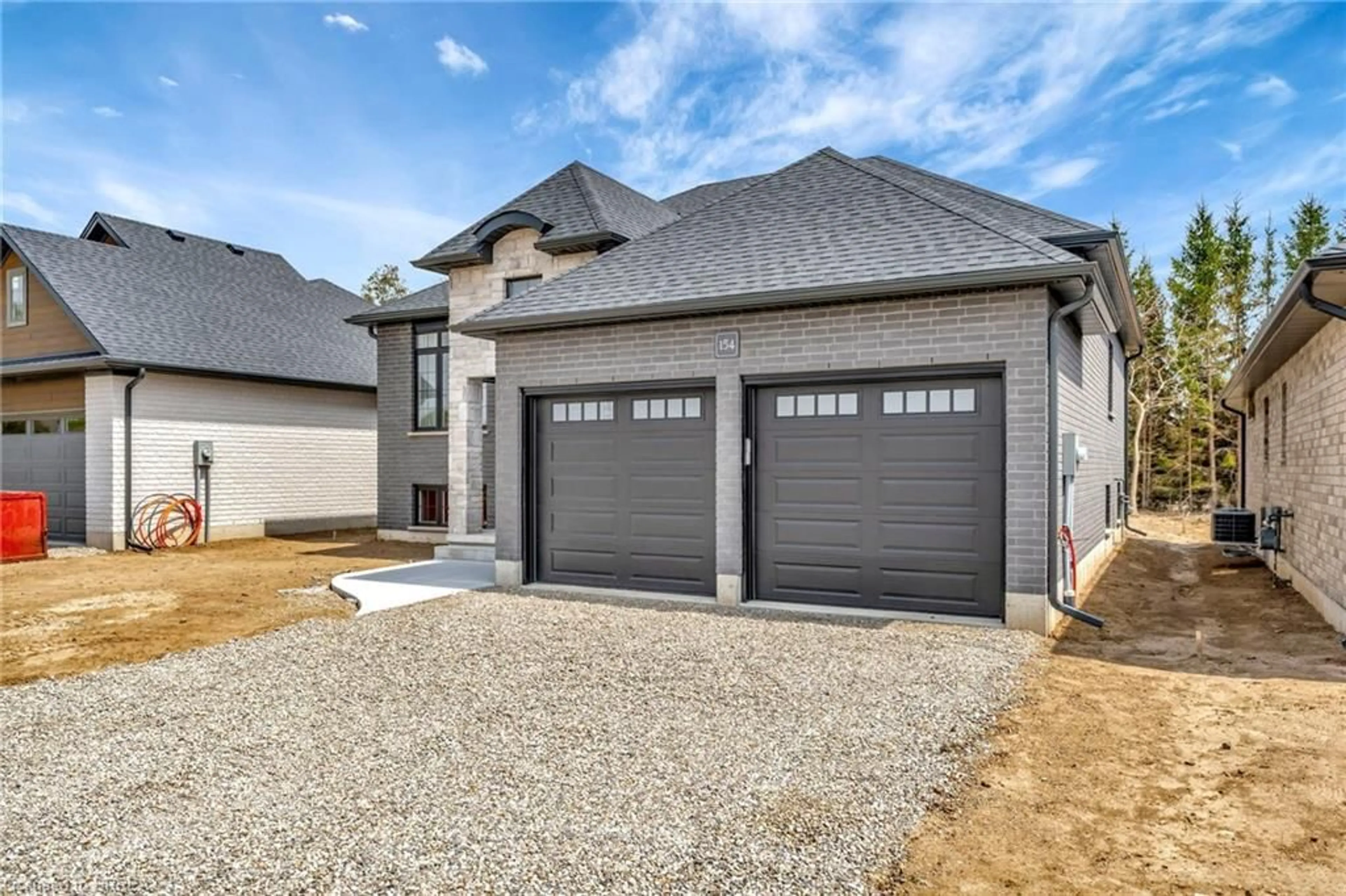 Home with brick exterior material, street for 154 Vanrooy Trail, Waterford Ontario N0E 1Y0