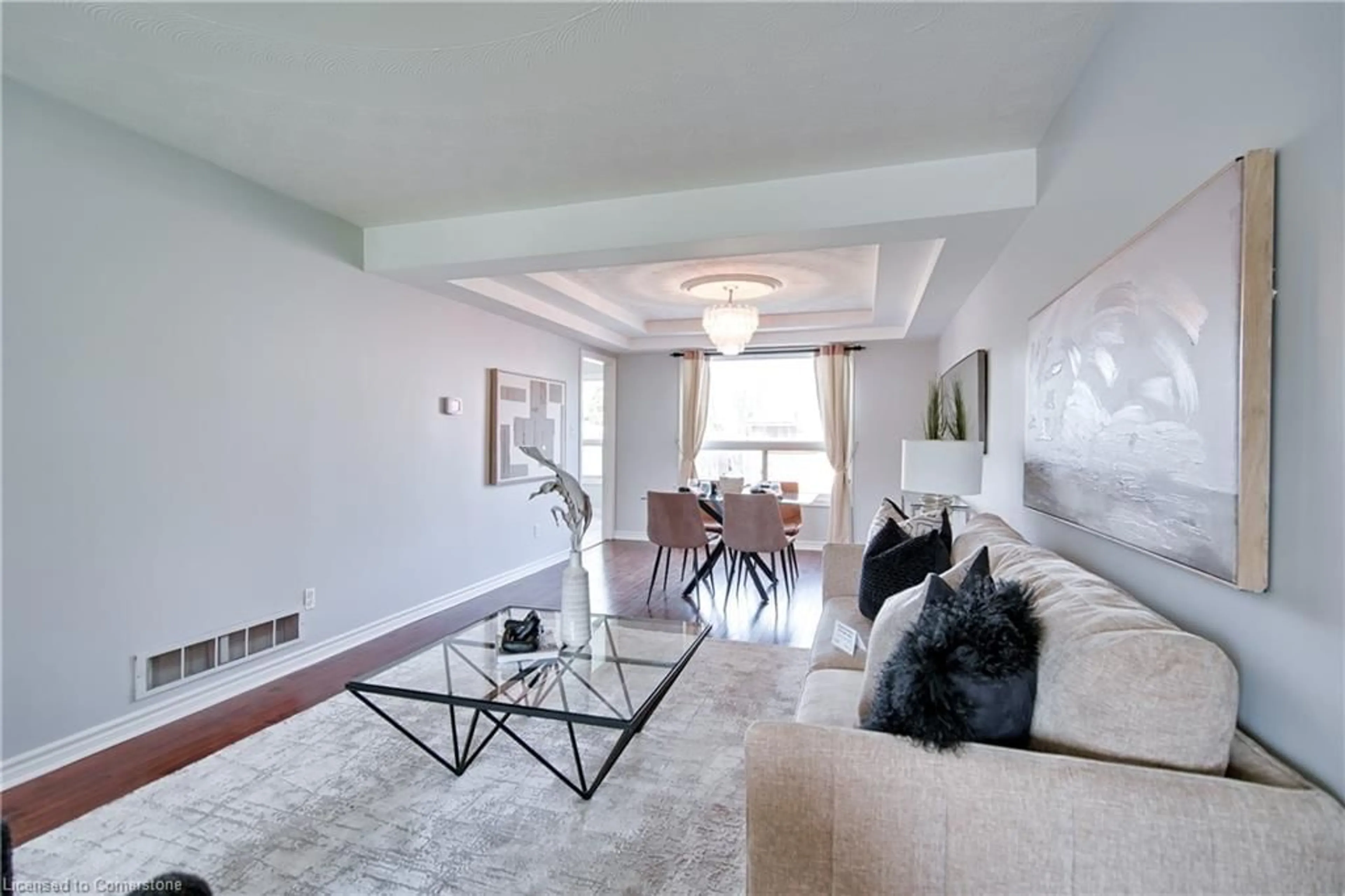 Living room with furniture, unknown for 112 Stone Church Rd, Hamilton Ontario L9B 1A3