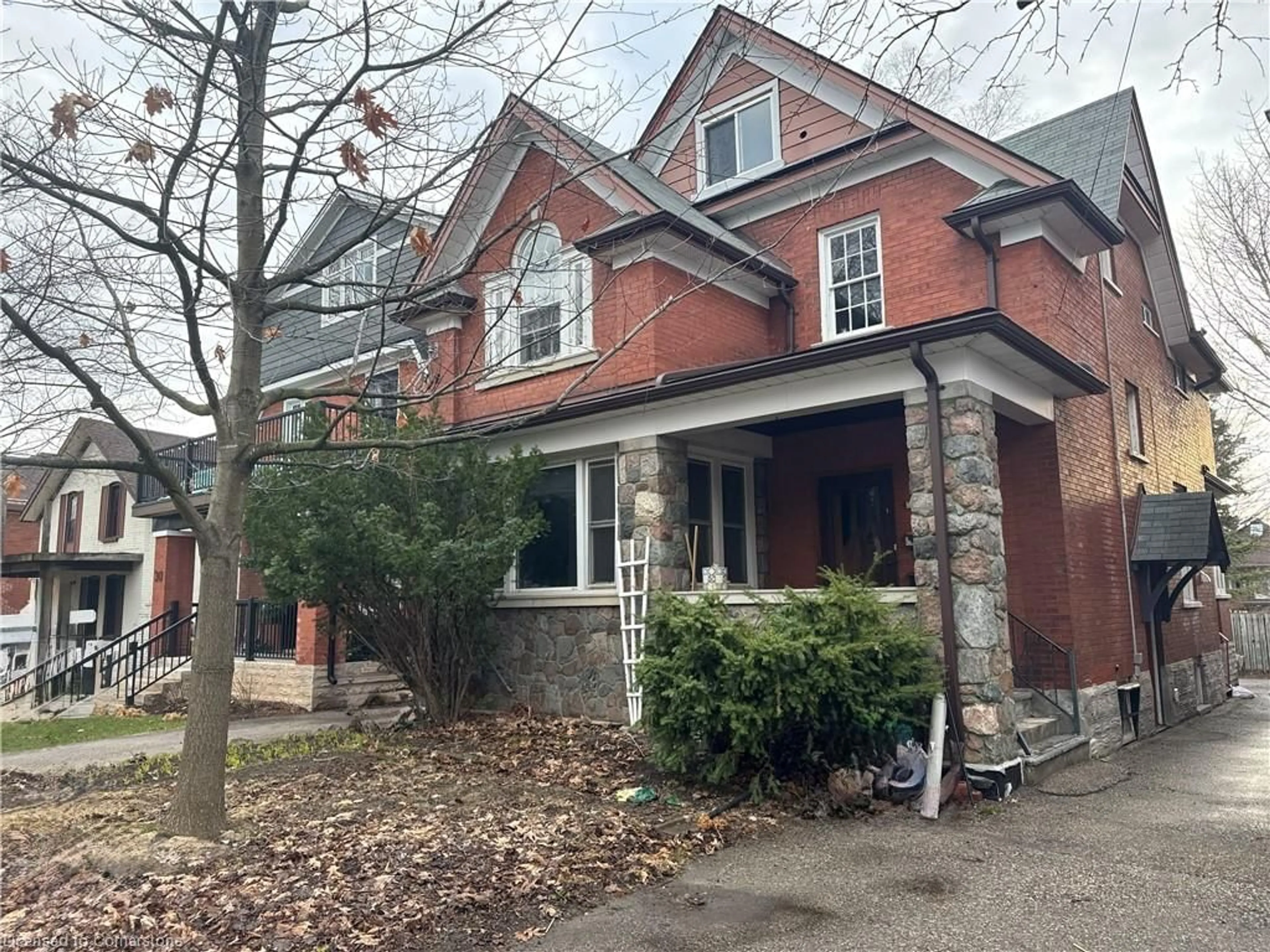 Home with brick exterior material, street for 32 Simeon St, Kitchener Ontario N2H 1S1