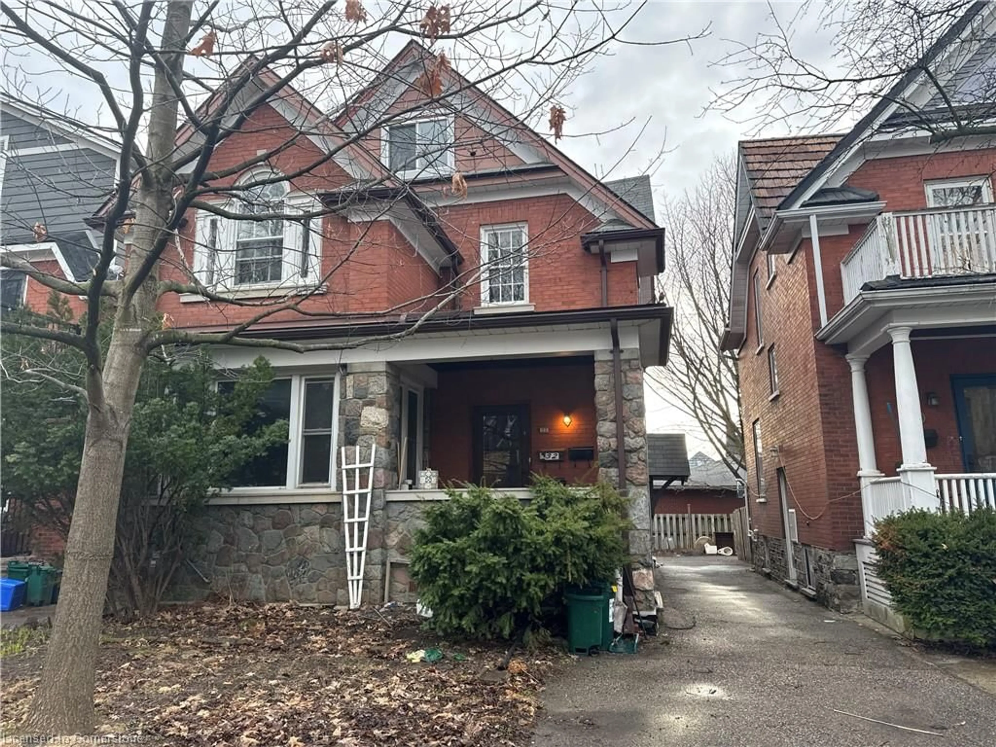 Home with brick exterior material, street for 32 Simeon St, Kitchener Ontario N2H 1S1