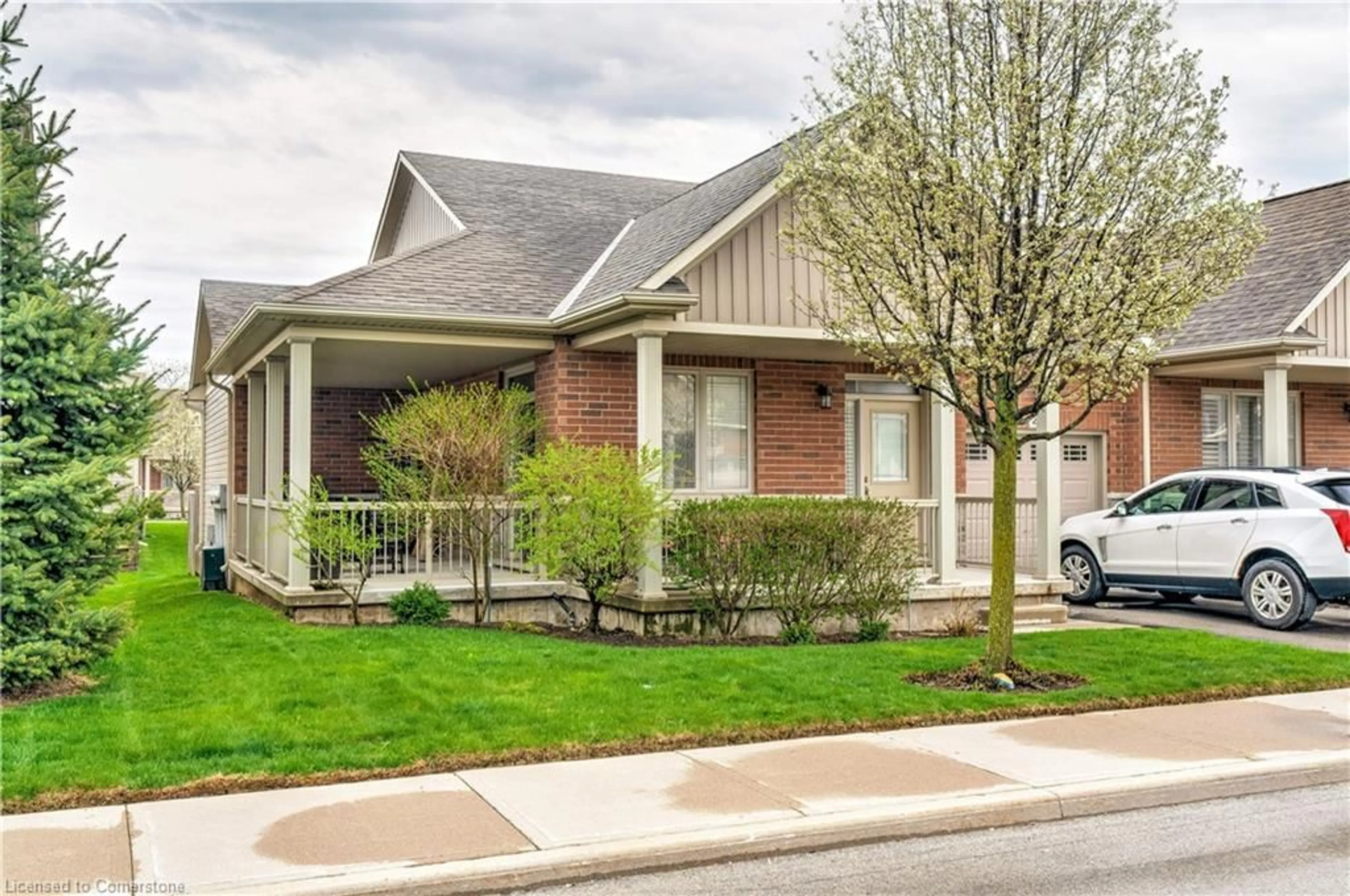 Home with brick exterior material, street for 22 Stickland Lane, Hamilton Ontario L0R 1C0