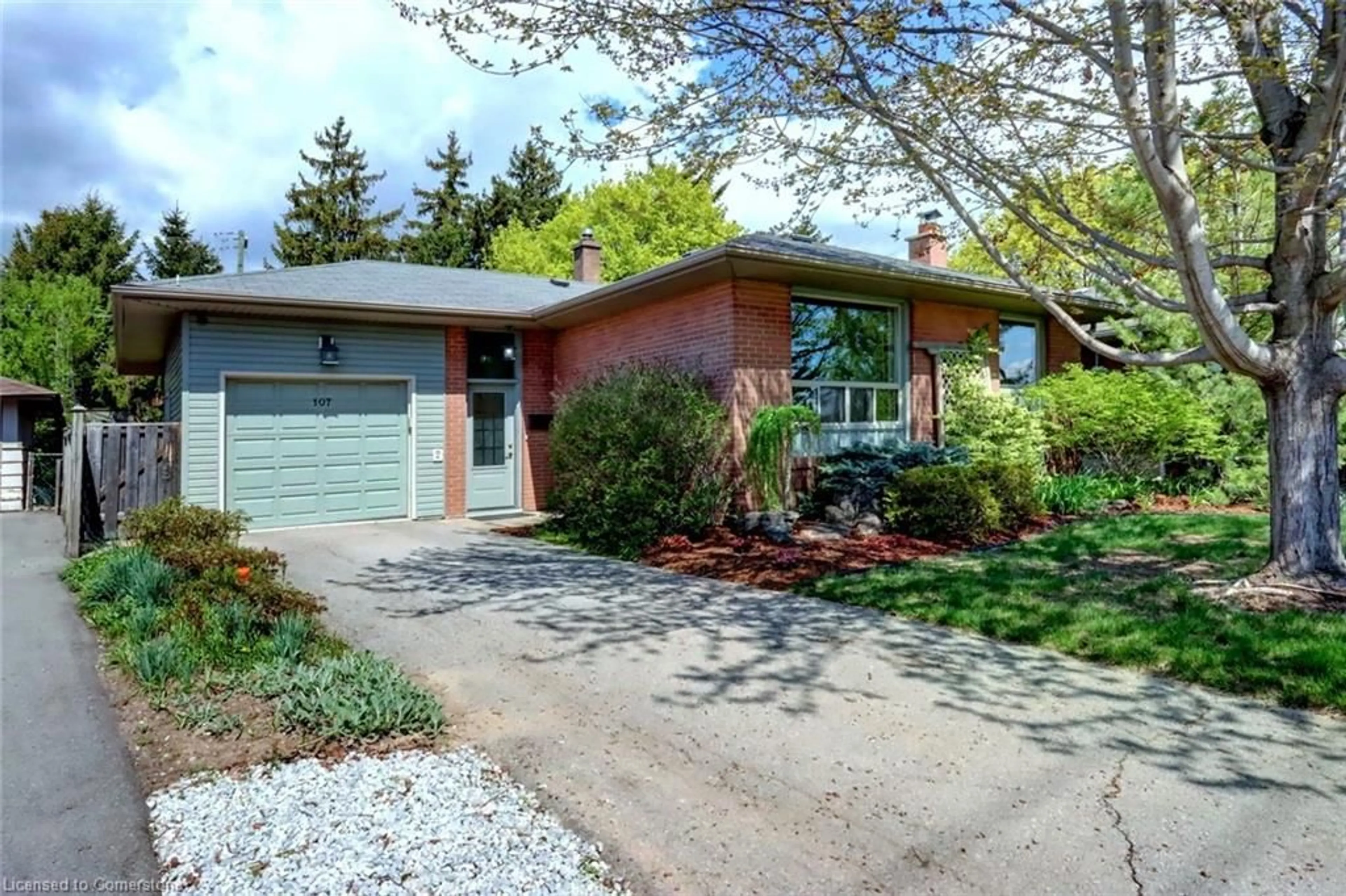 Home with brick exterior material, street for 107 Prince Charles Dr, Georgetown Ontario L7G 3V5