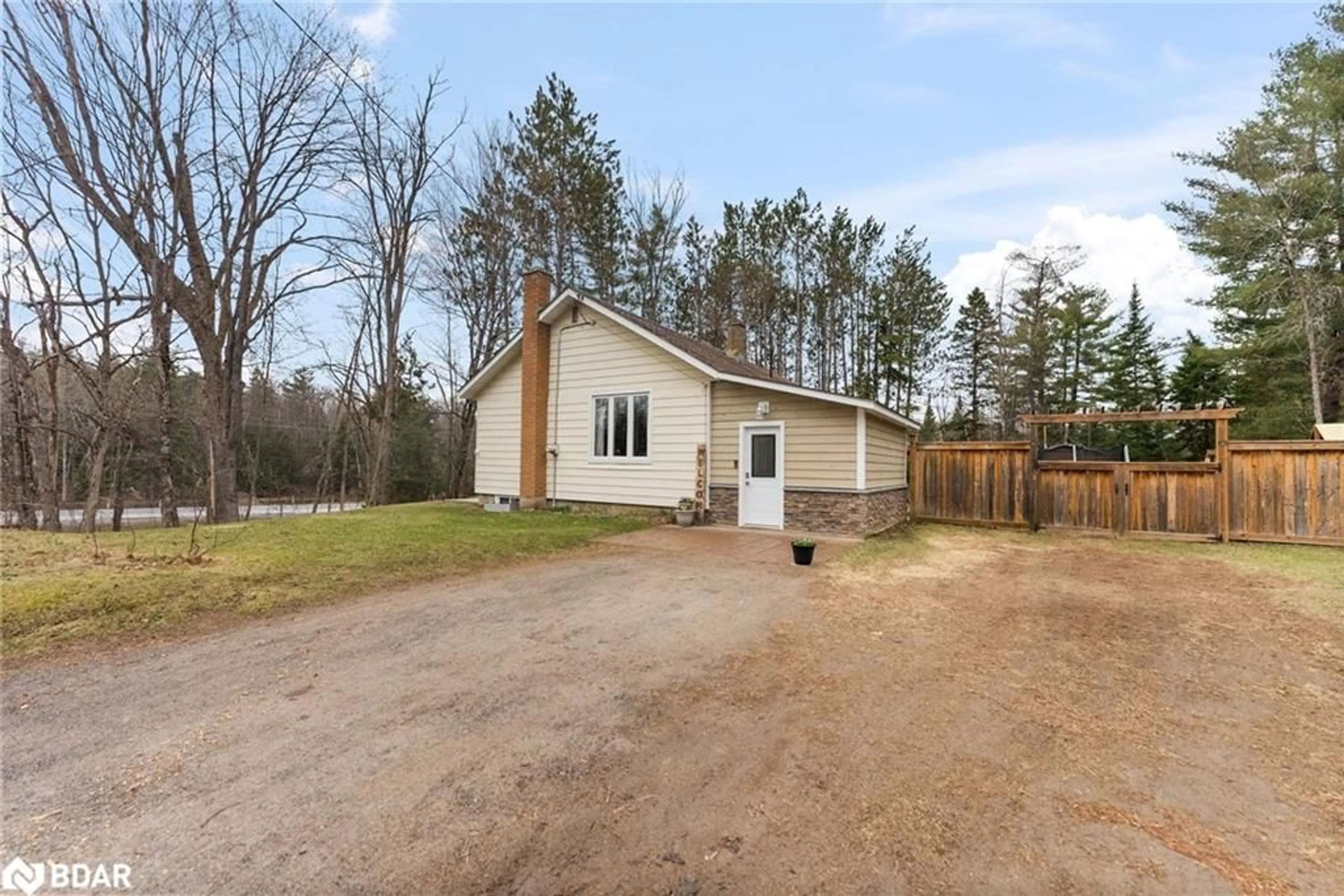 A pic from outside/outdoor area/front of a property/back of a property/a pic from drone, unknown for 58 River St, Apsley Ontario K0L 1A0