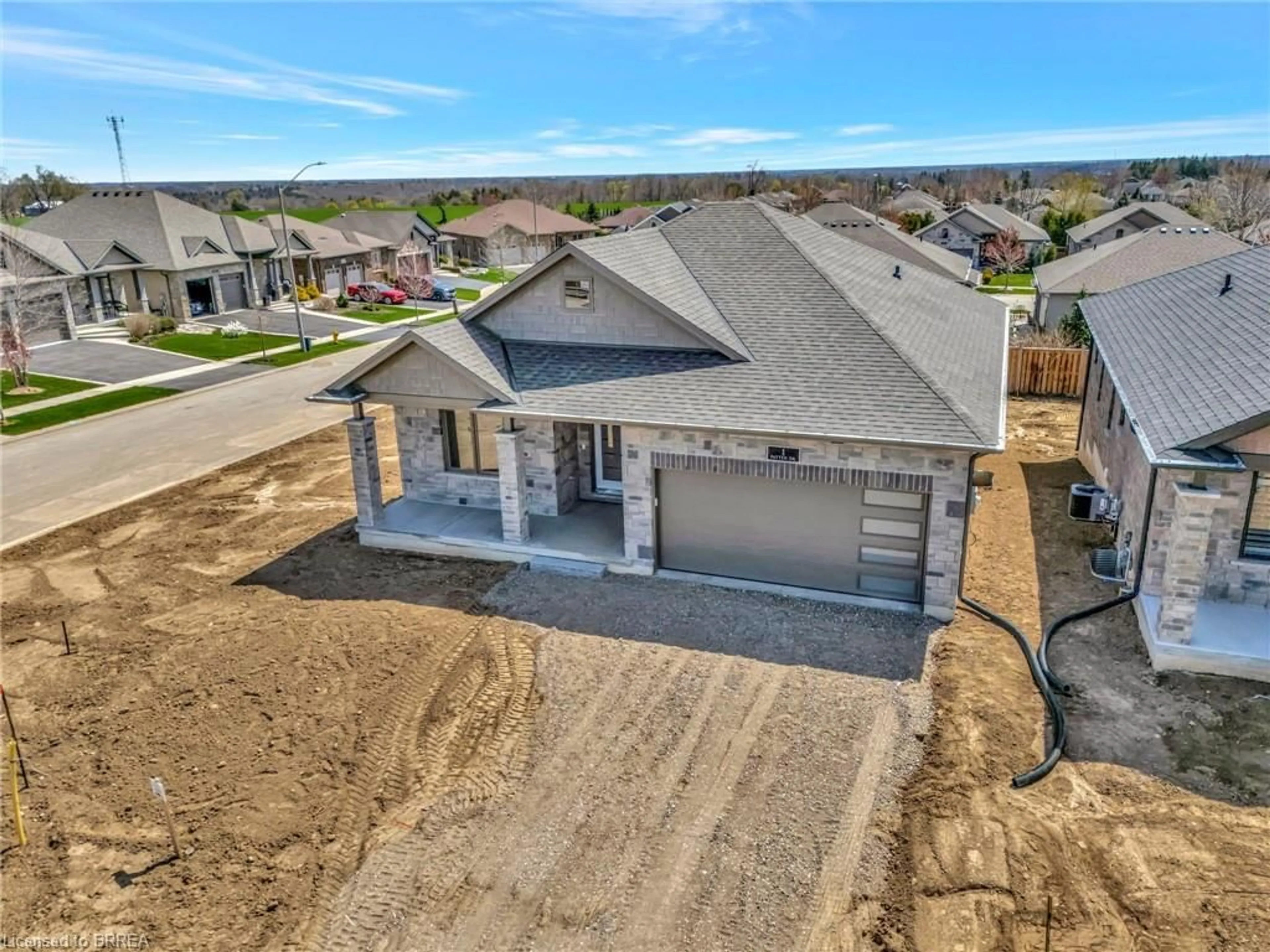 A pic from outside/outdoor area/front of a property/back of a property/a pic from drone, unknown for 1 Patten Dr, St. George Ontario N0E 1N0