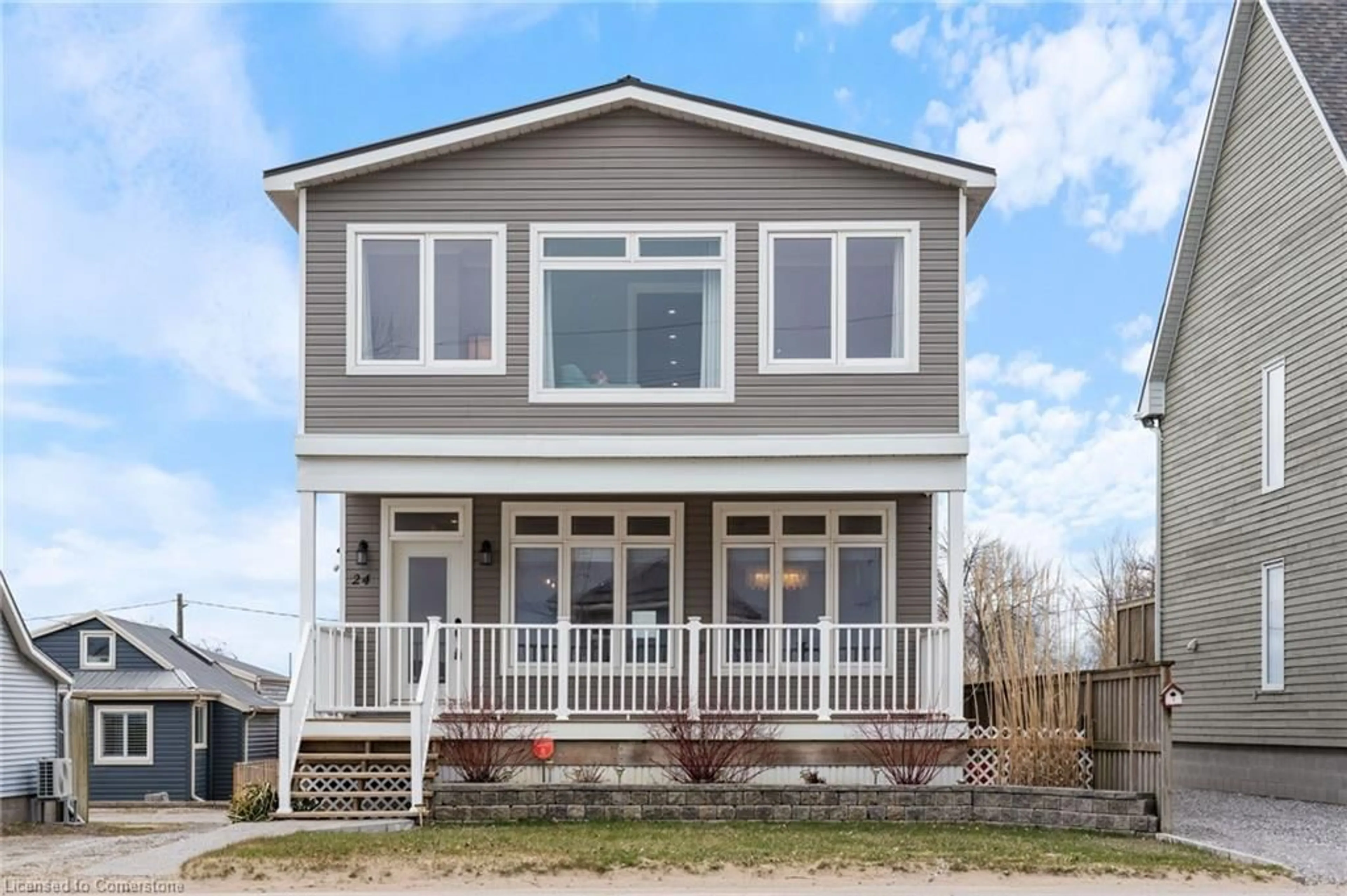 Home with vinyl exterior material, street for 24 Erie Blvd, Long Point Ontario N0E 1M0