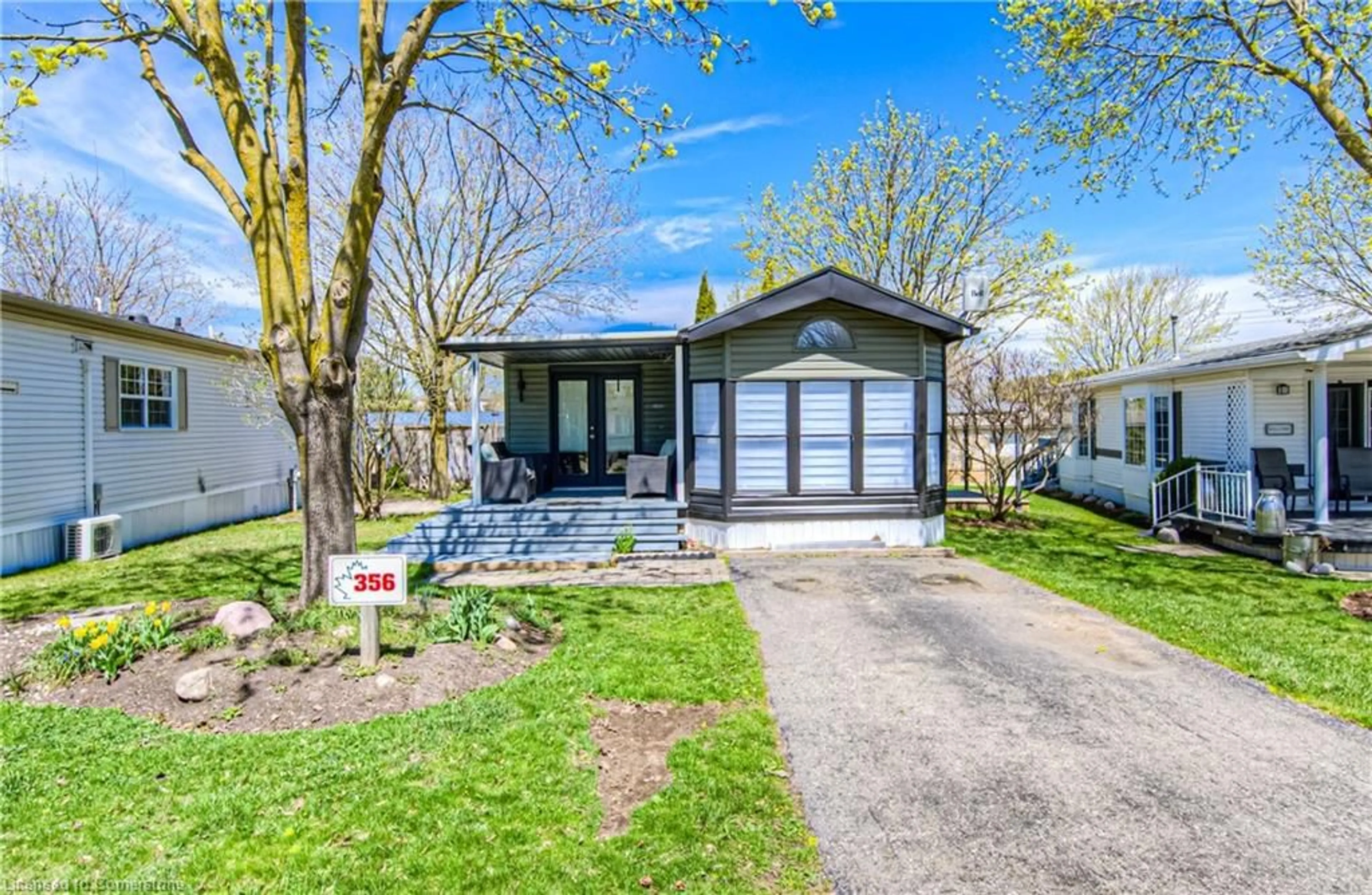 Home with vinyl exterior material, street for 580 Beaver Creek Rd #356, Waterloo Ontario N2J 3Z4
