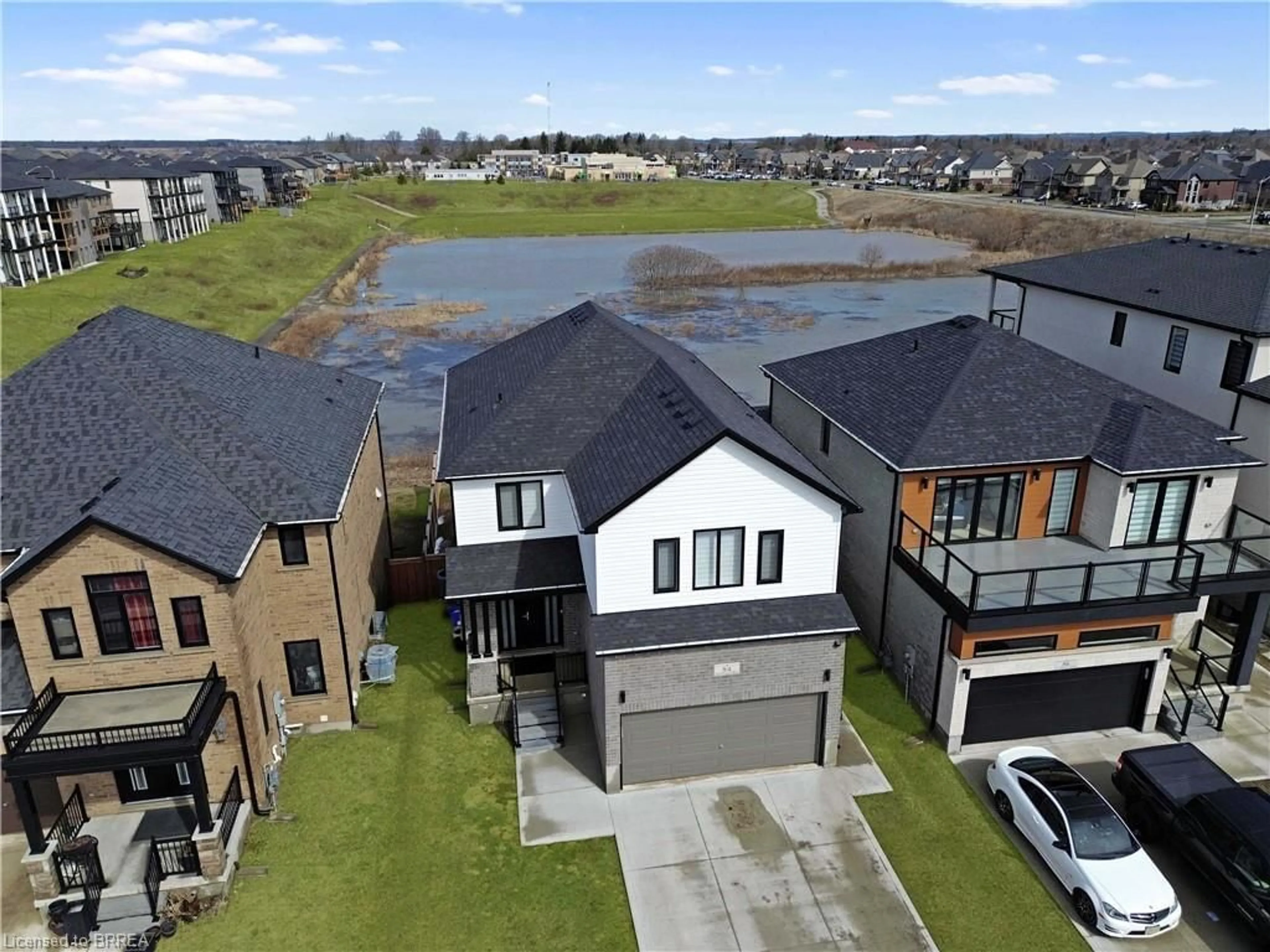 A pic from outside/outdoor area/front of a property/back of a property/a pic from drone, water/lake/river/ocean view for 84 Grandville Cir, Paris Ontario N3L 0J5