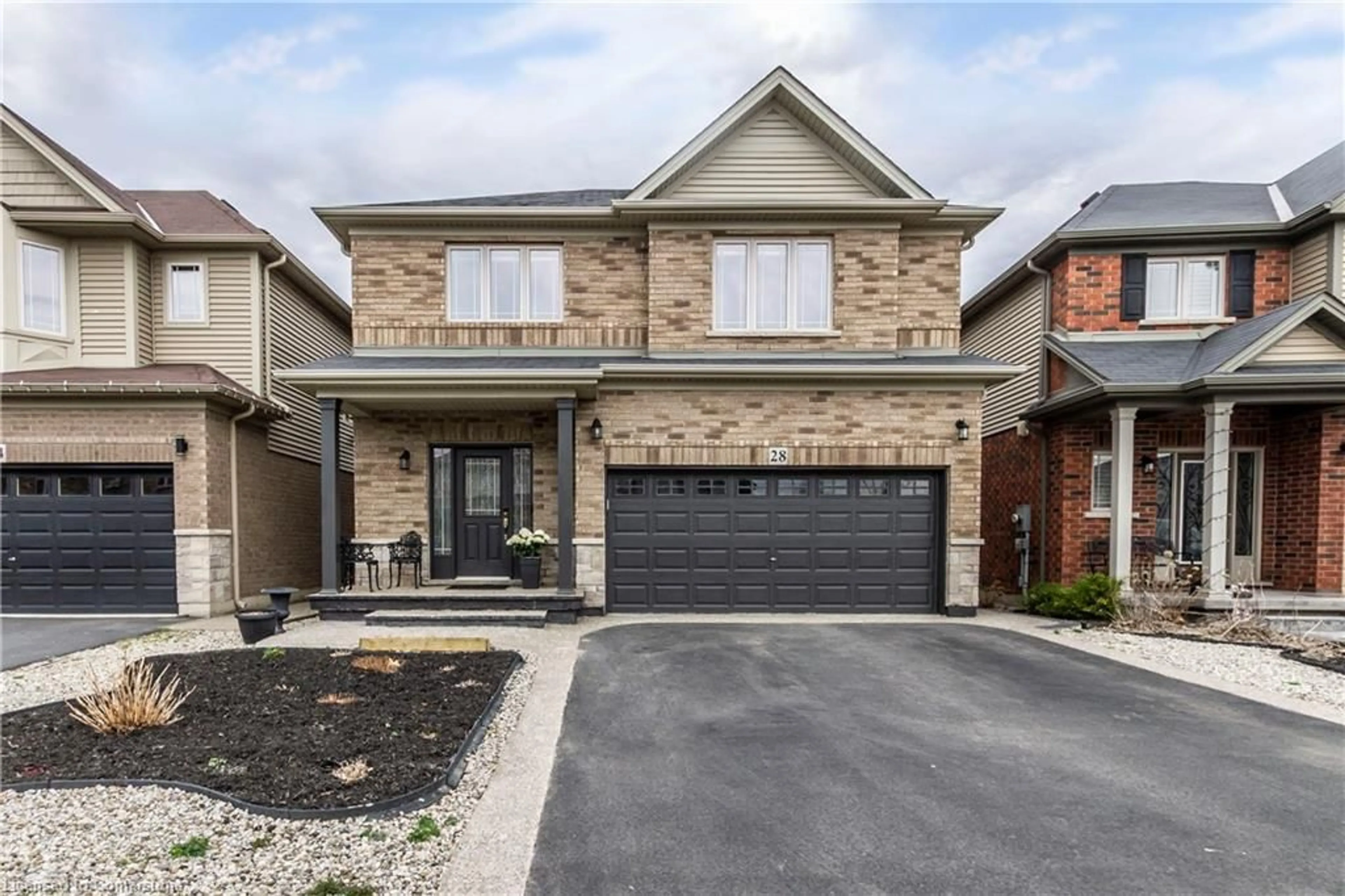Home with brick exterior material, street for 28 Chamomile Dr, Hamilton Ontario L8W 0C1