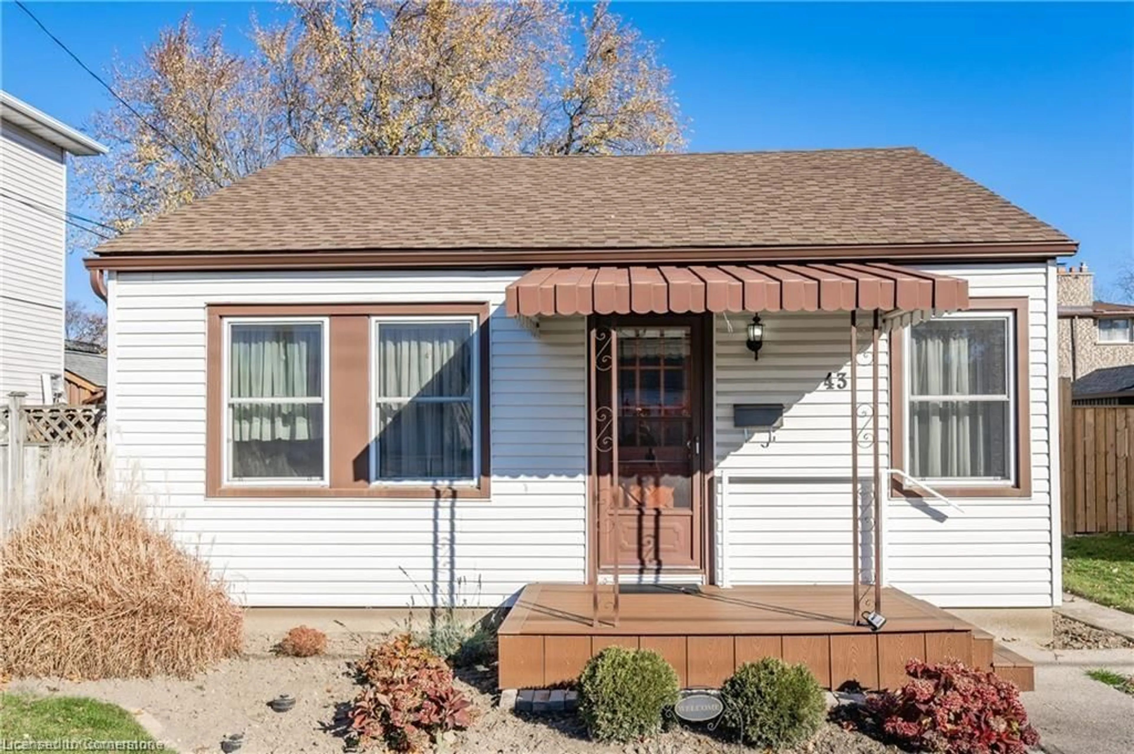 Home with vinyl exterior material, street for 43 Munn St, Hamilton Ontario L8V 1K1