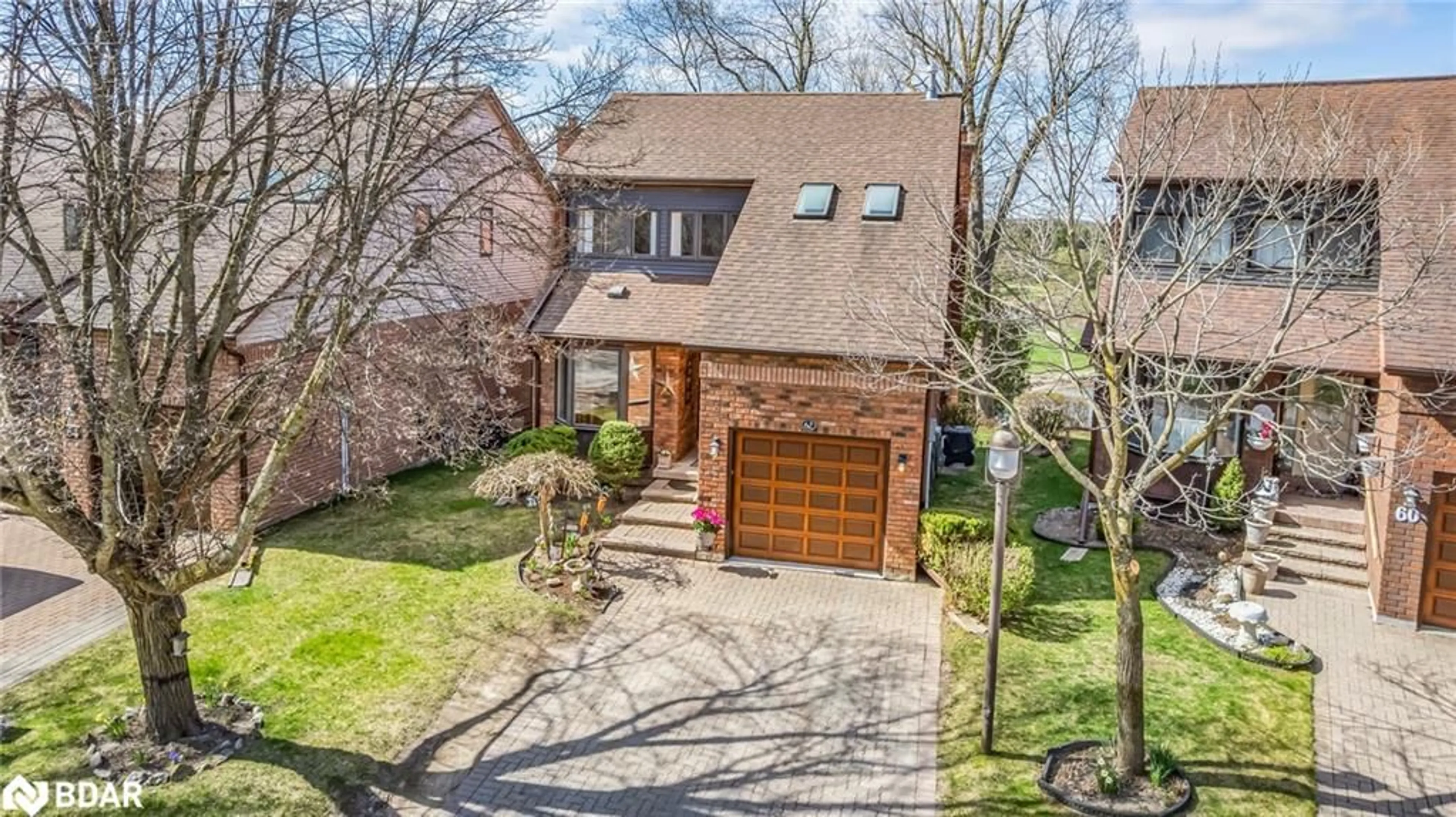 Home with brick exterior material, street for 62 Riverview Rd #4, Alliston Ontario L9R 1R8