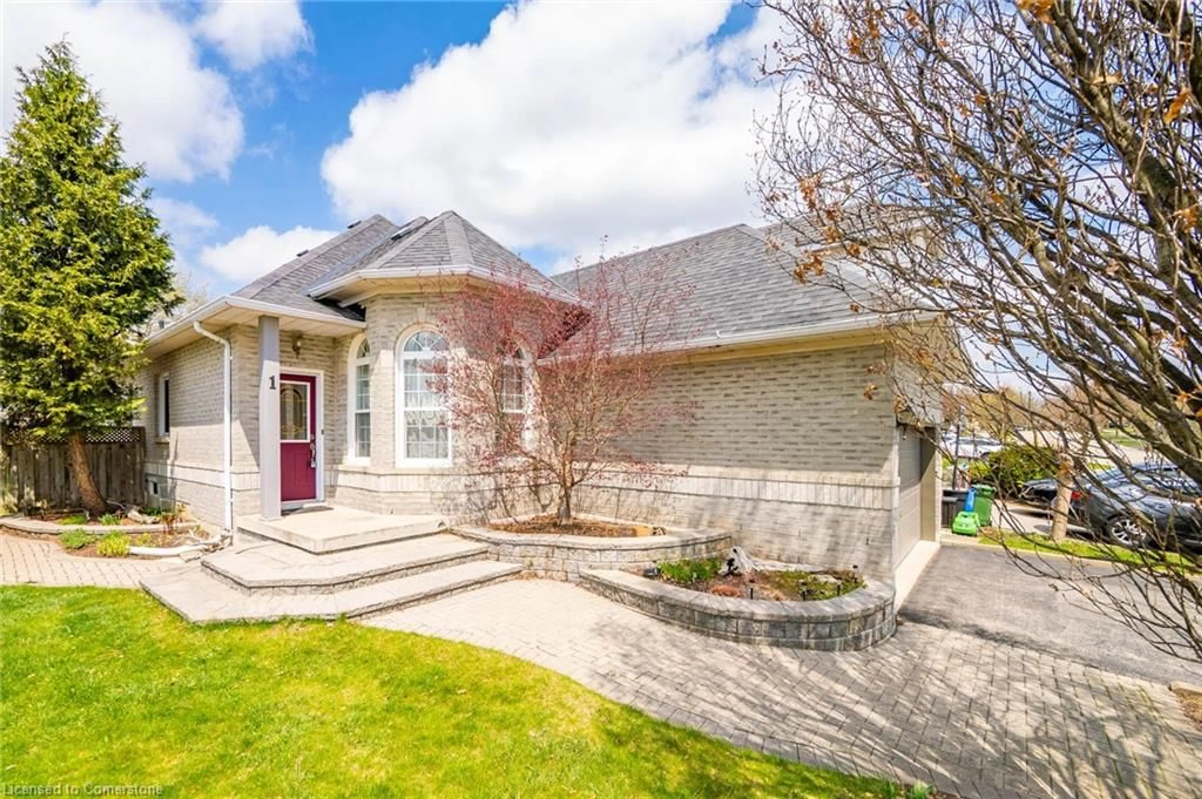 Home with brick exterior material, street for 1 Strathroy Cres, Waterdown Ontario L8B 0N5