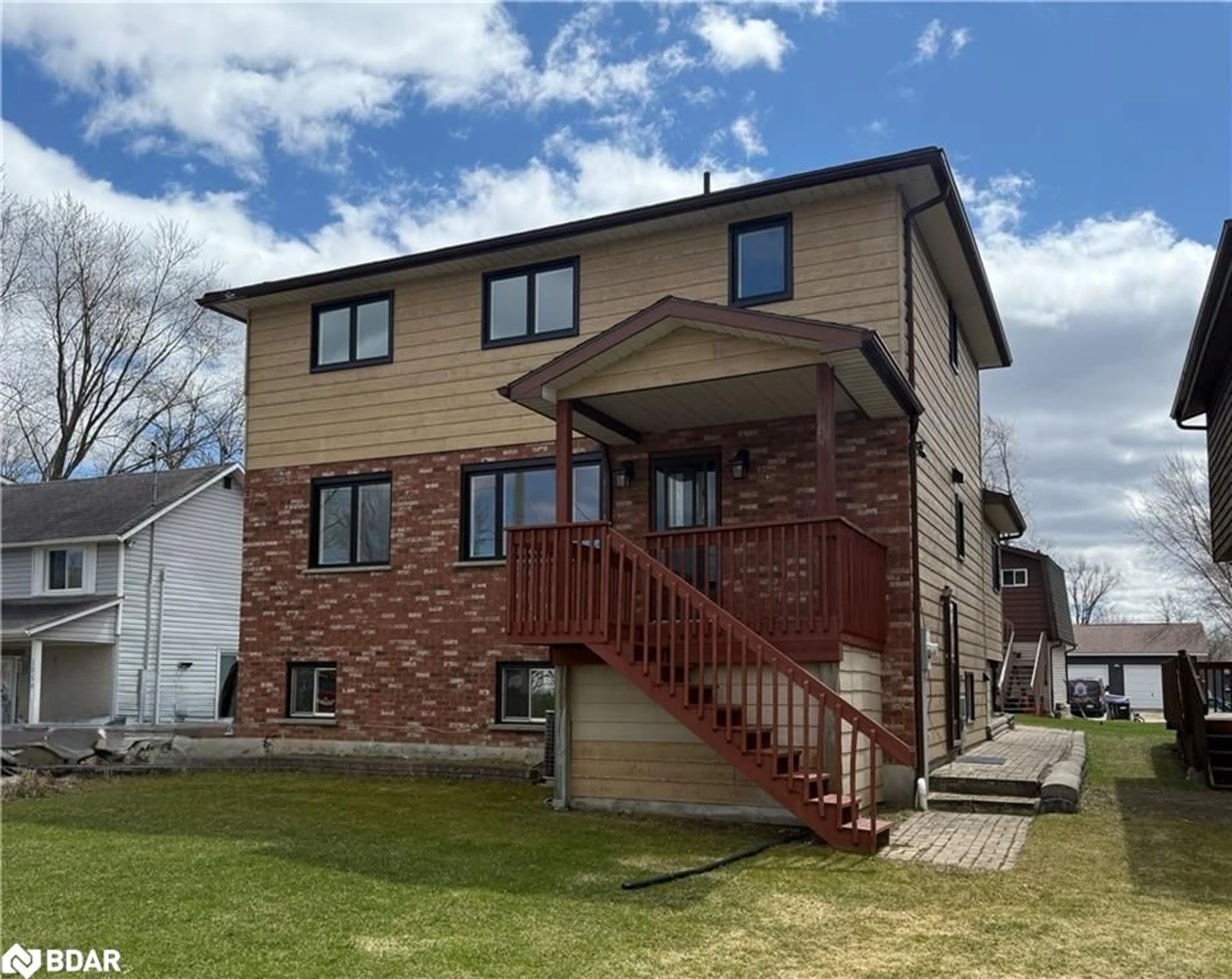 Home with brick exterior material, street for 1063 Wood St, Innisfil Ontario L0L 1K0