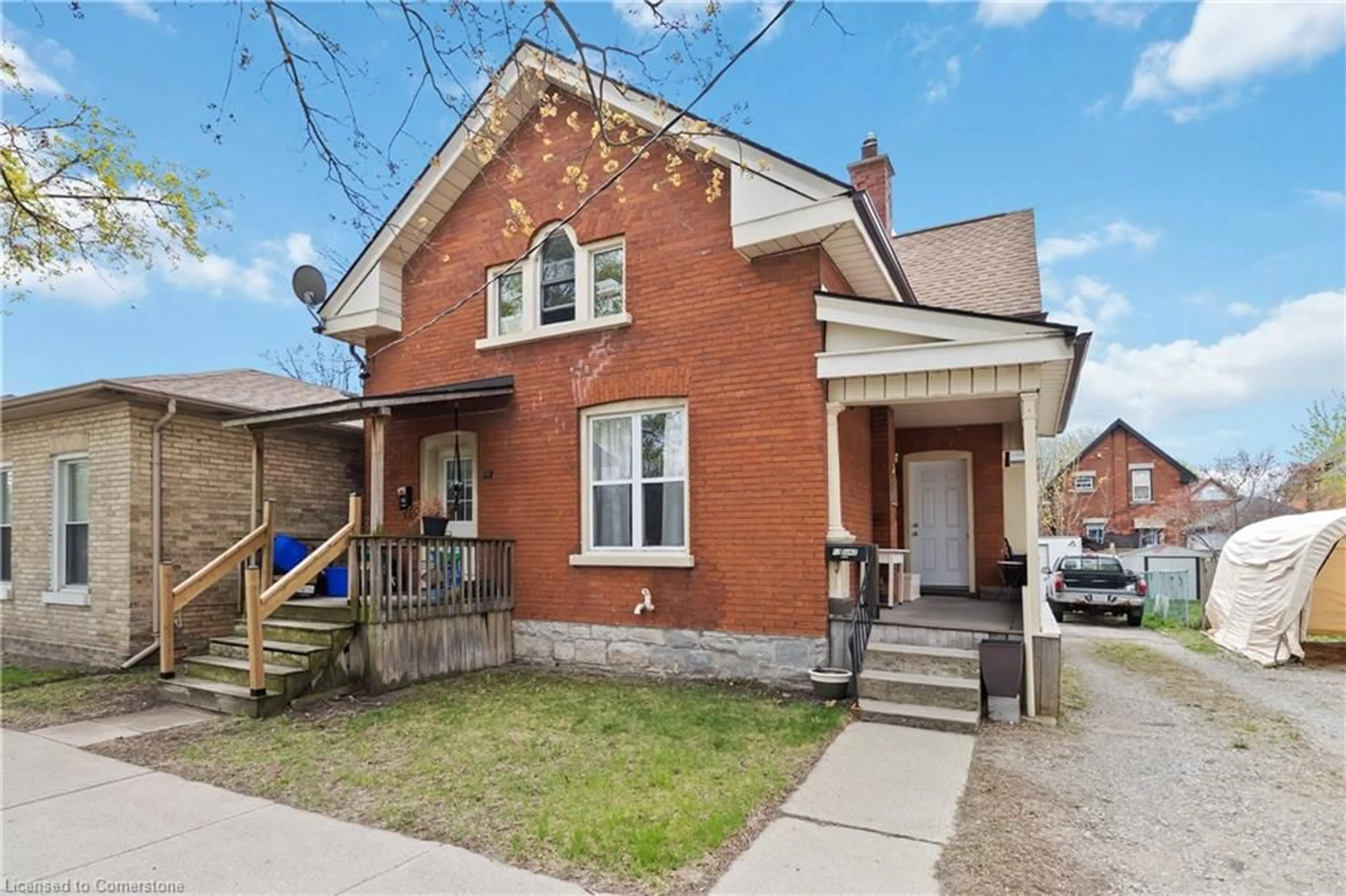 Home with brick exterior material, street for 12 Duke St, Brantford Ontario N3T 3T3