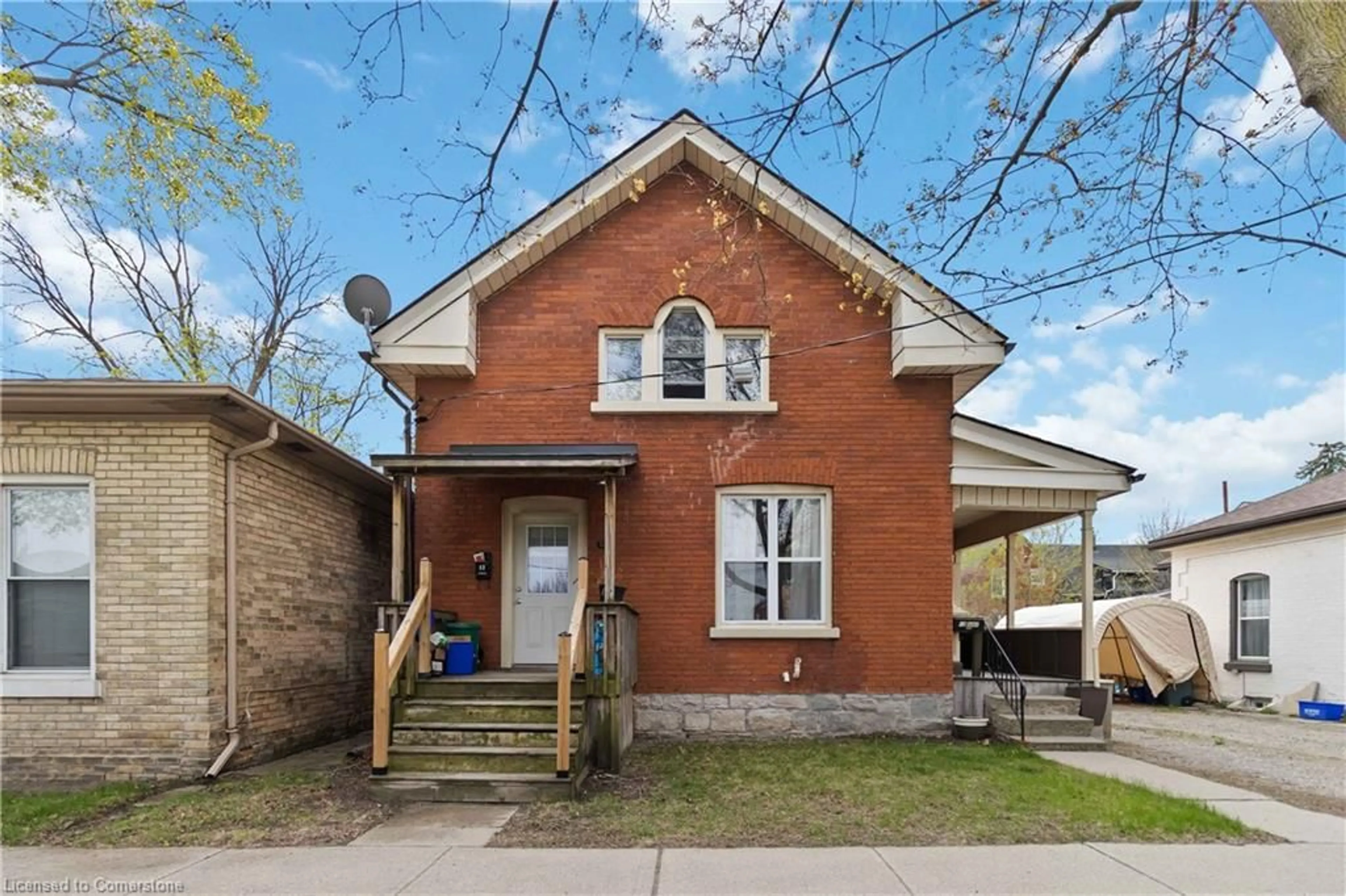 Home with brick exterior material, street for 12 Duke St, Brantford Ontario N3T 3T3