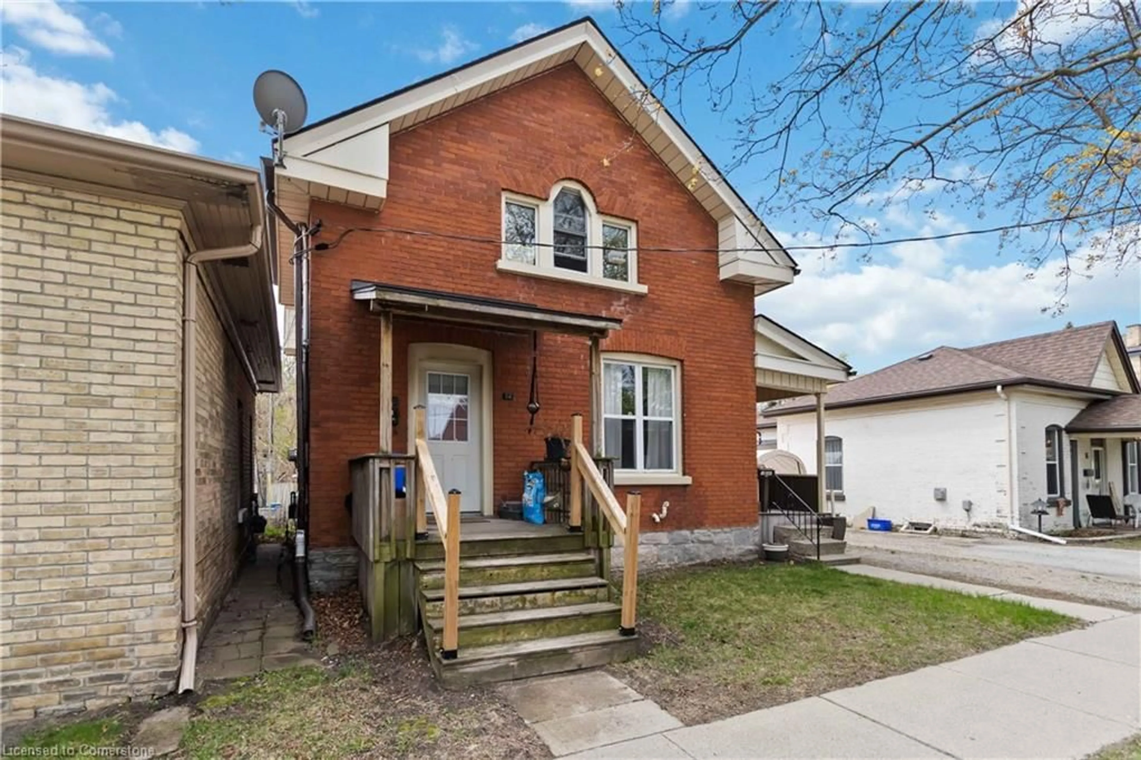 Home with brick exterior material, street for 12 Duke St, Brantford Ontario N3T 3T3