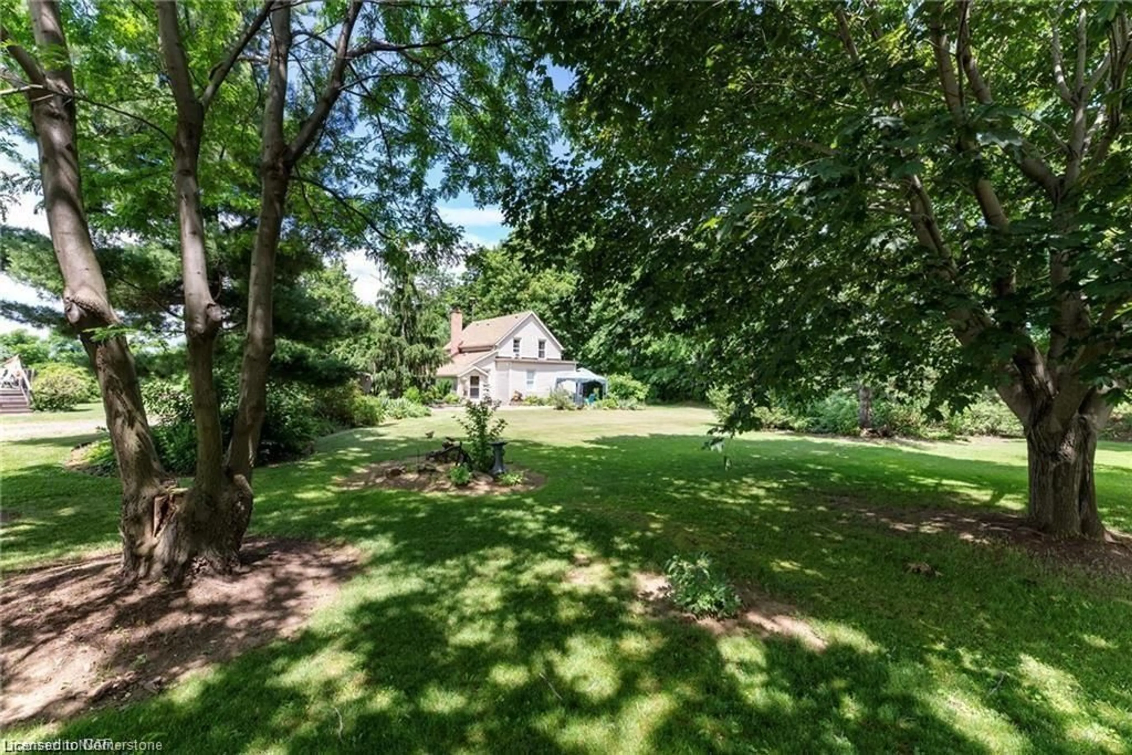 A pic from outside/outdoor area/front of a property/back of a property/a pic from drone, forest/trees view for 5400 North Service Rd, Beamsville Ontario L0R 1B3
