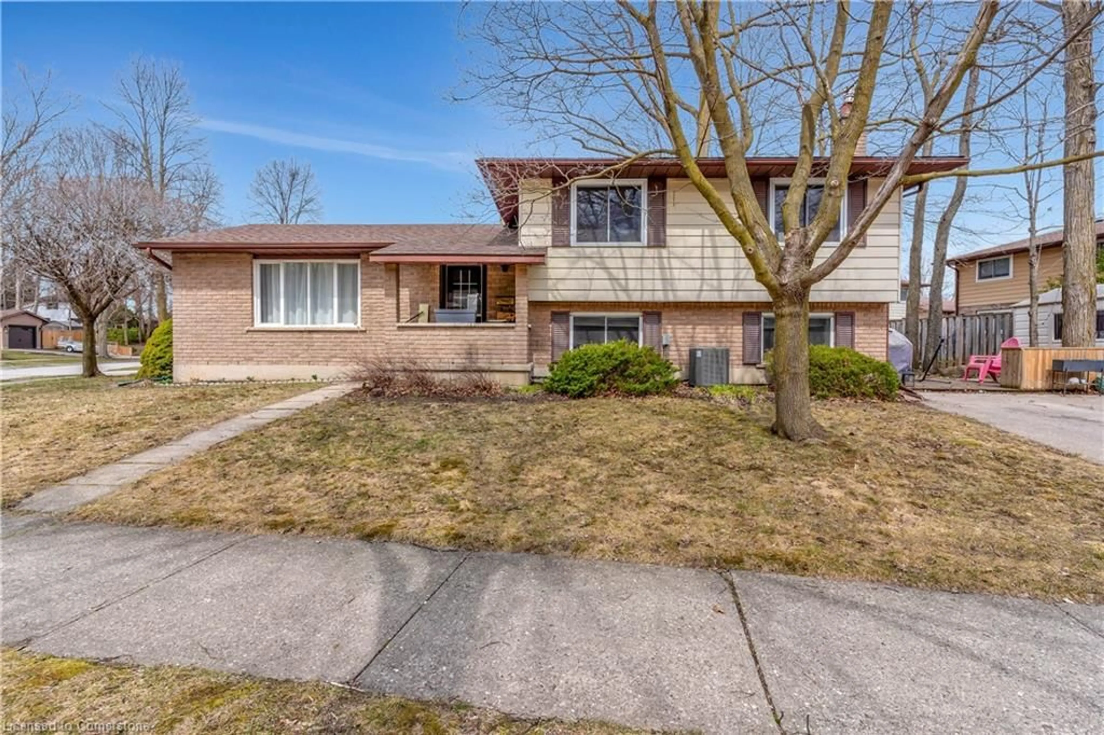Home with brick exterior material, street for 113 Martinglen Cres, Kitchener Ontario N2E 2A3