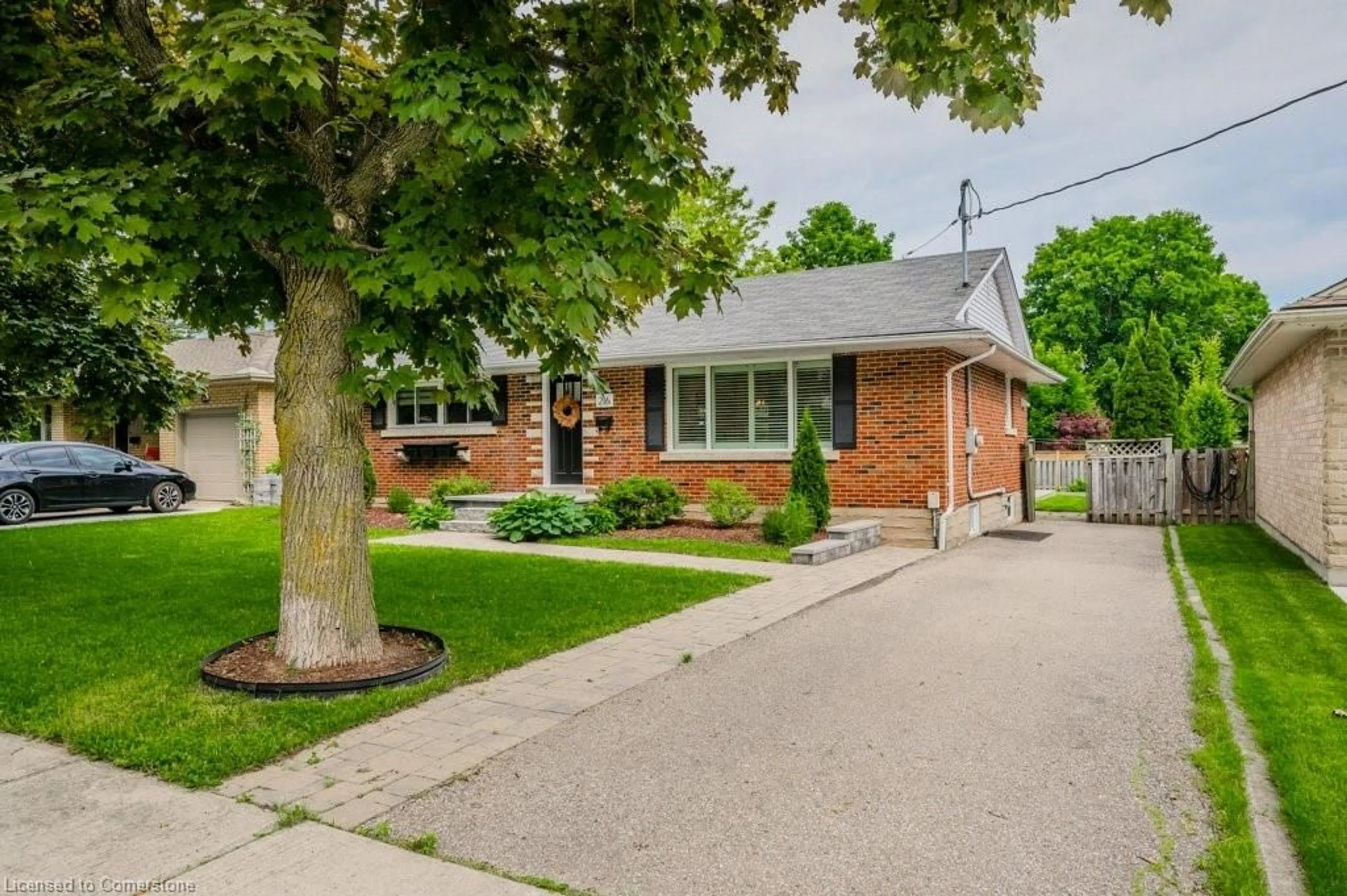 Home with brick exterior material, street for 216 Rodney St, Waterloo Ontario N2J 1G5