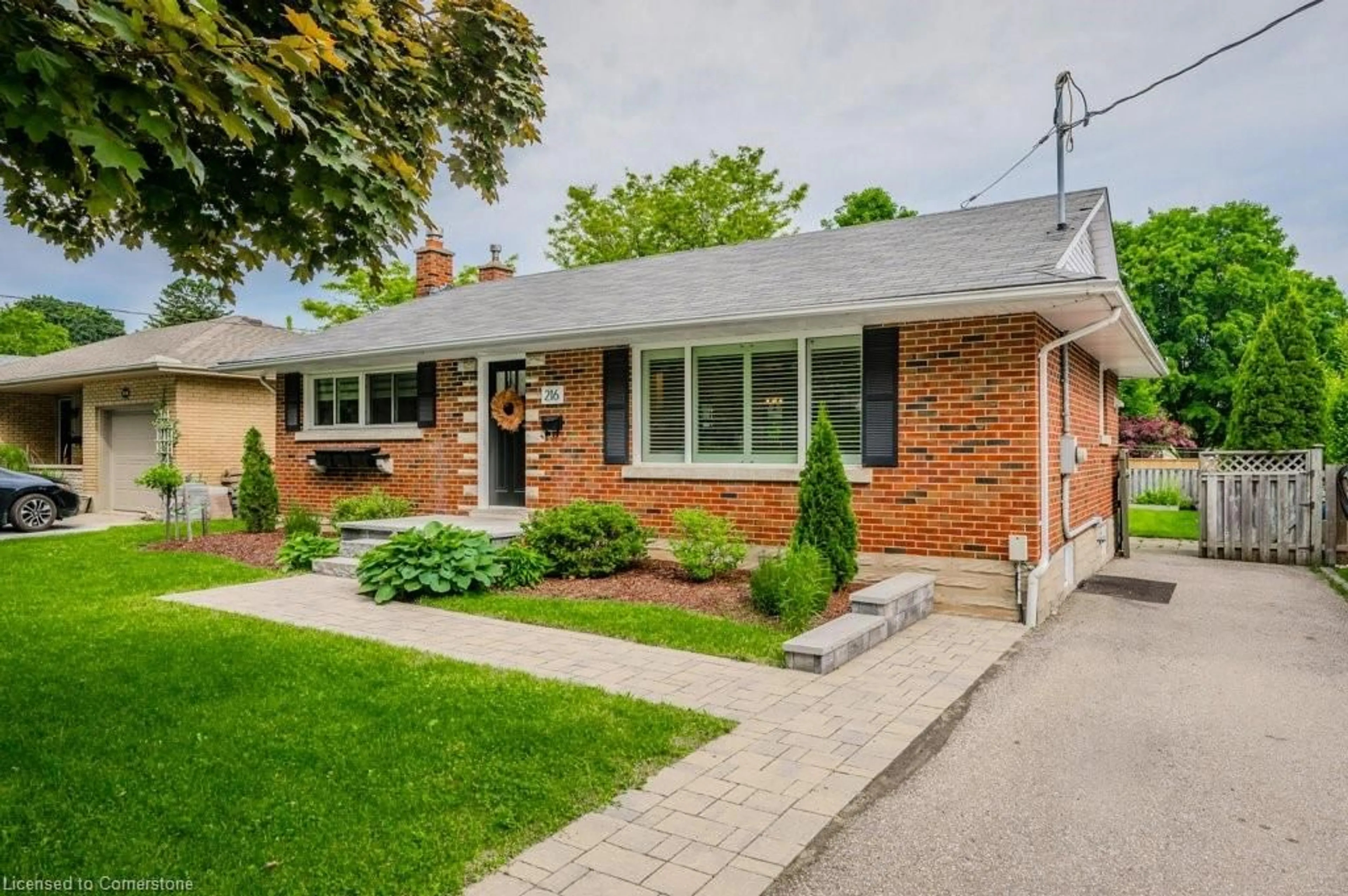 Home with brick exterior material, street for 216 Rodney St, Waterloo Ontario N2J 1G5