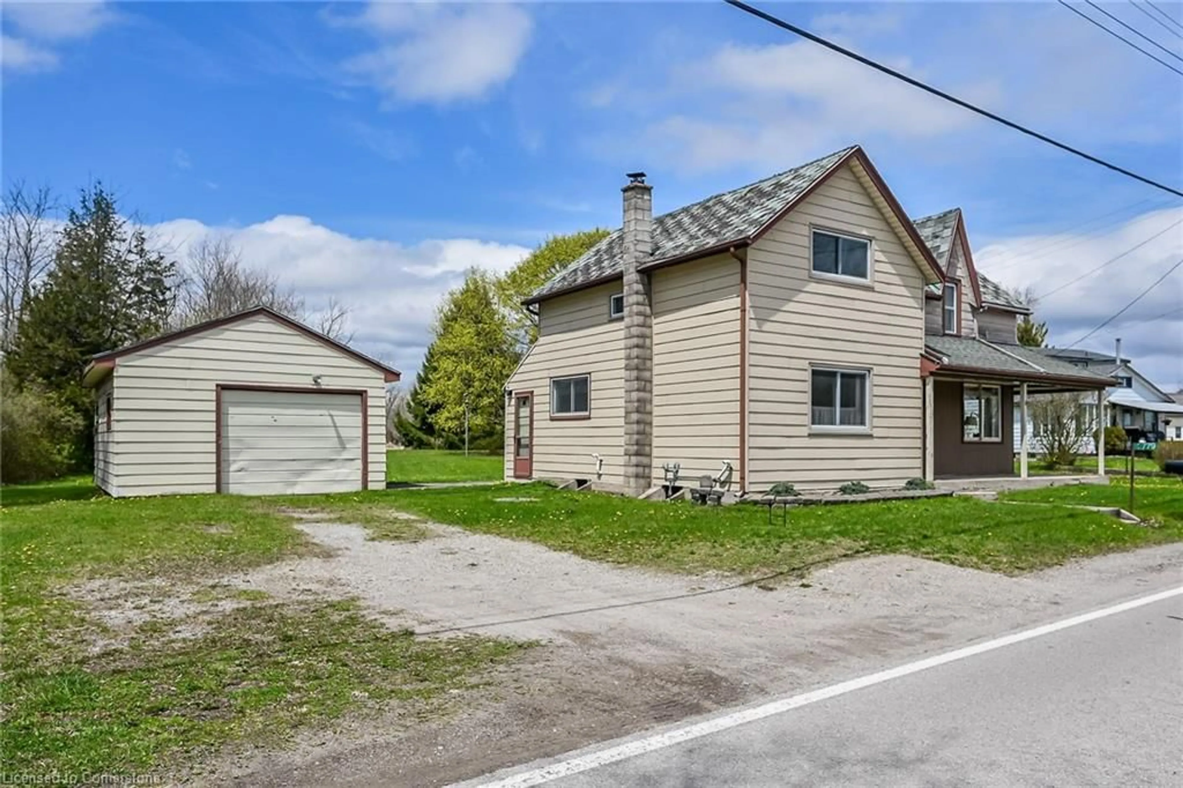 A pic from outside/outdoor area/front of a property/back of a property/a pic from drone, street for 2779 North Shore Dr, Lowbanks Ontario N0A 1K0