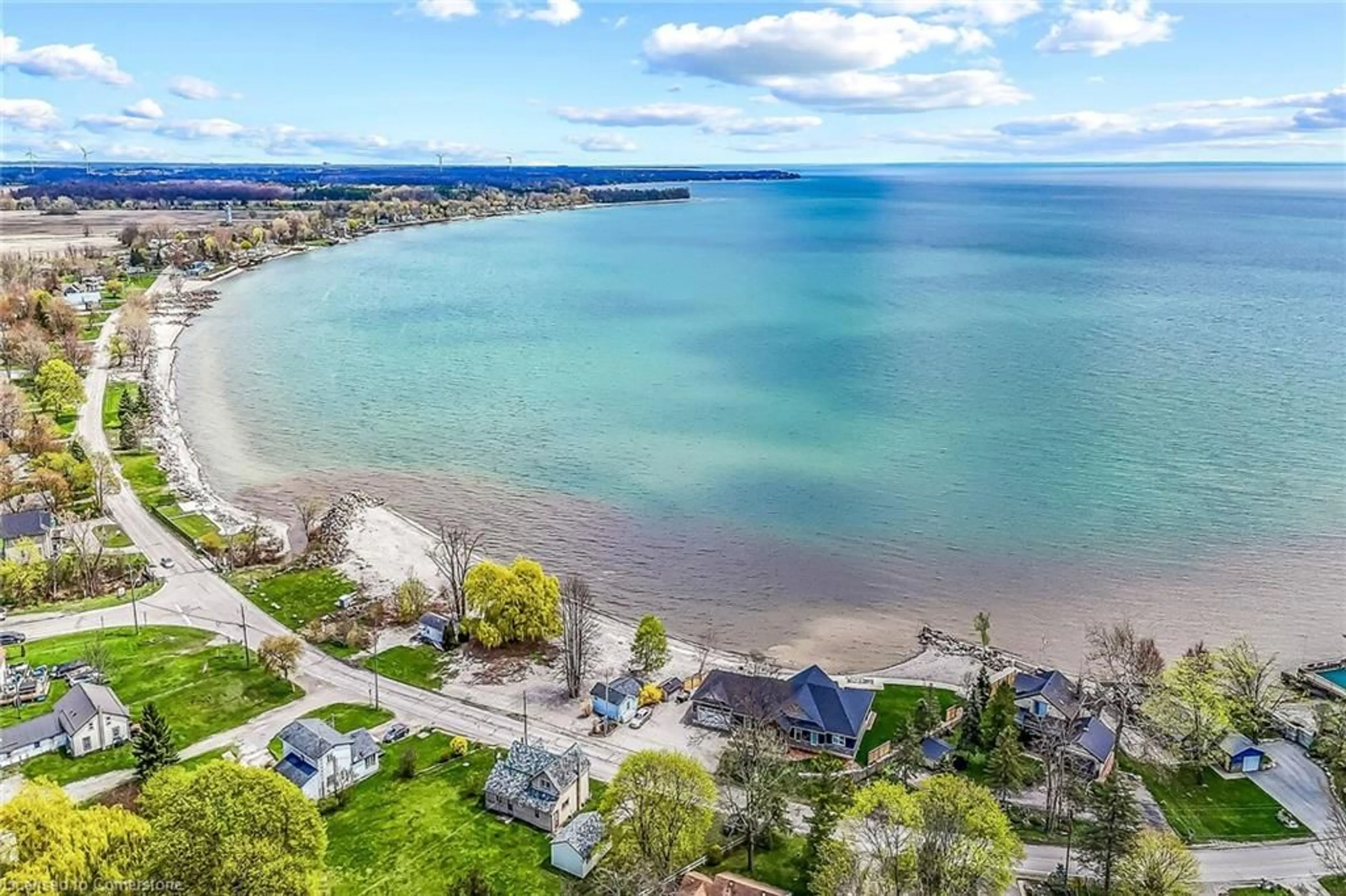 A pic from outside/outdoor area/front of a property/back of a property/a pic from drone, water/lake/river/ocean view for 2779 North Shore Dr, Lowbanks Ontario N0A 1K0
