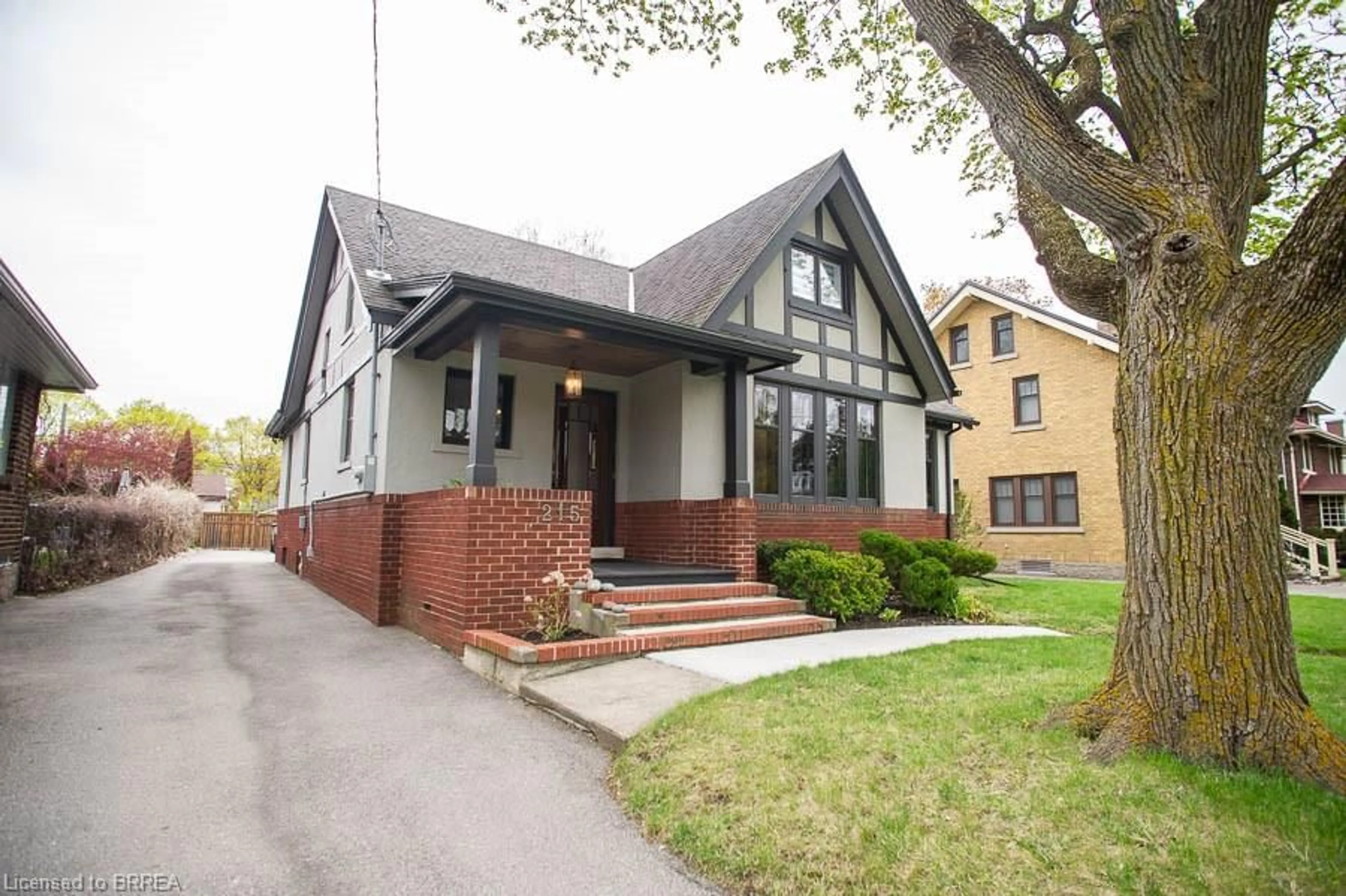 Home with brick exterior material, street for 215 Grand River St, Paris Ontario N3L 2N4