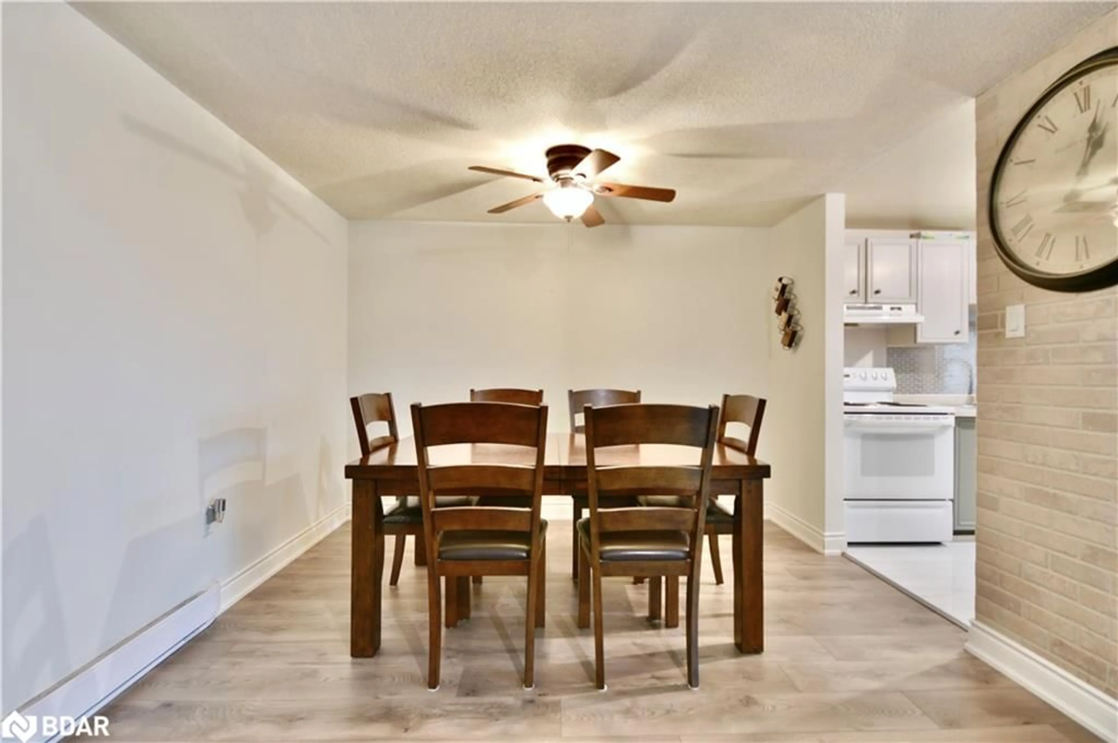 Dining room, wood/laminate floor for 11 Pheasant Trail, Barrie Ontario L4N 6W4