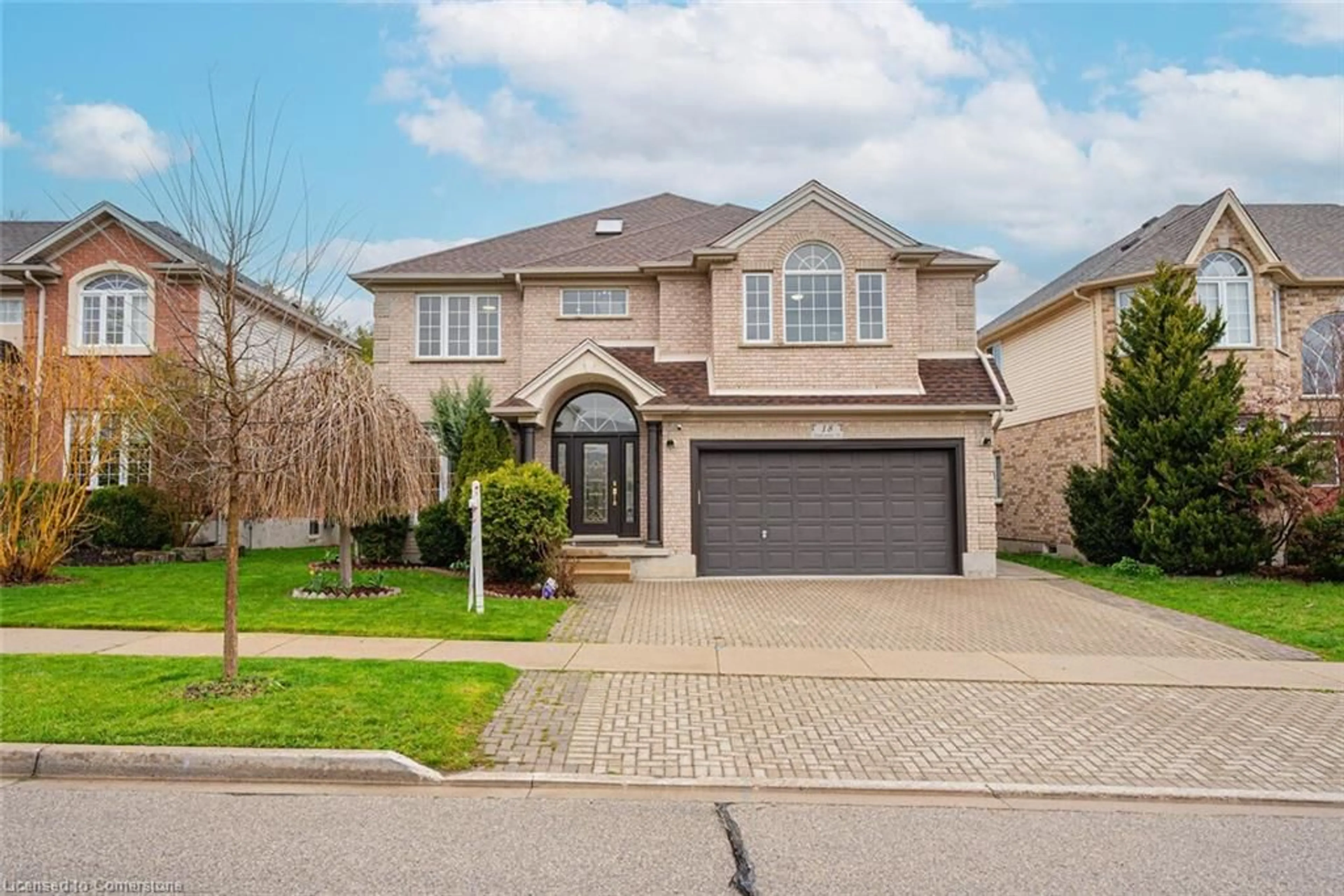 Home with brick exterior material, street for 18 Hawkswood Dr, Waterloo Ontario N2K 4J6