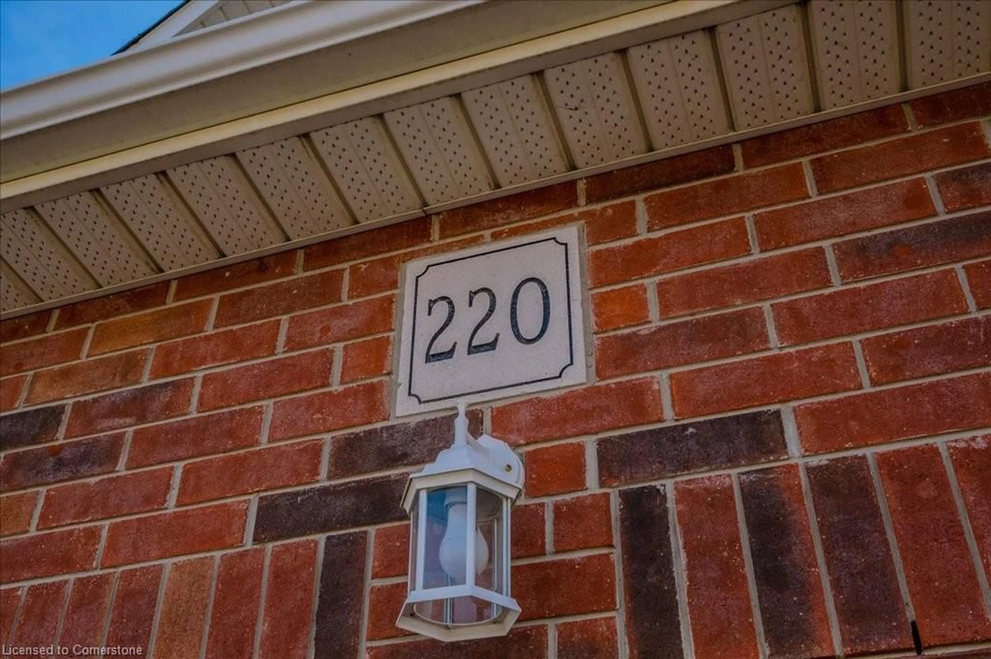 Home with brick exterior material, street for 220 Doon South Dr, Kitchener Ontario N2P 2L8