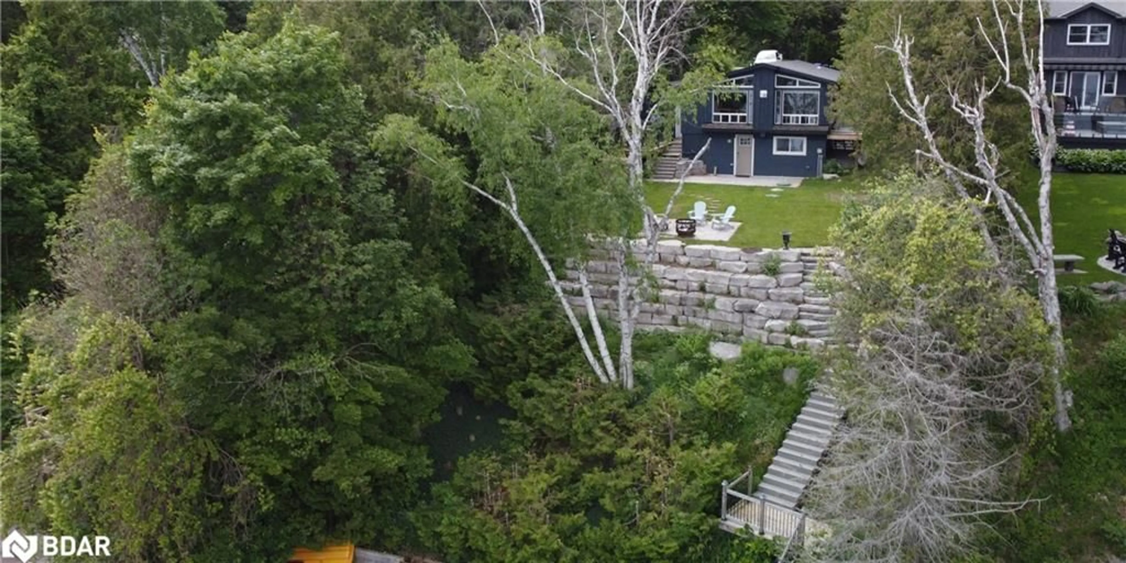 A pic from outside/outdoor area/front of a property/back of a property/a pic from drone, unknown for 2295 Lakeshore Road East Rd, Hawkestone Ontario L0L 1T0