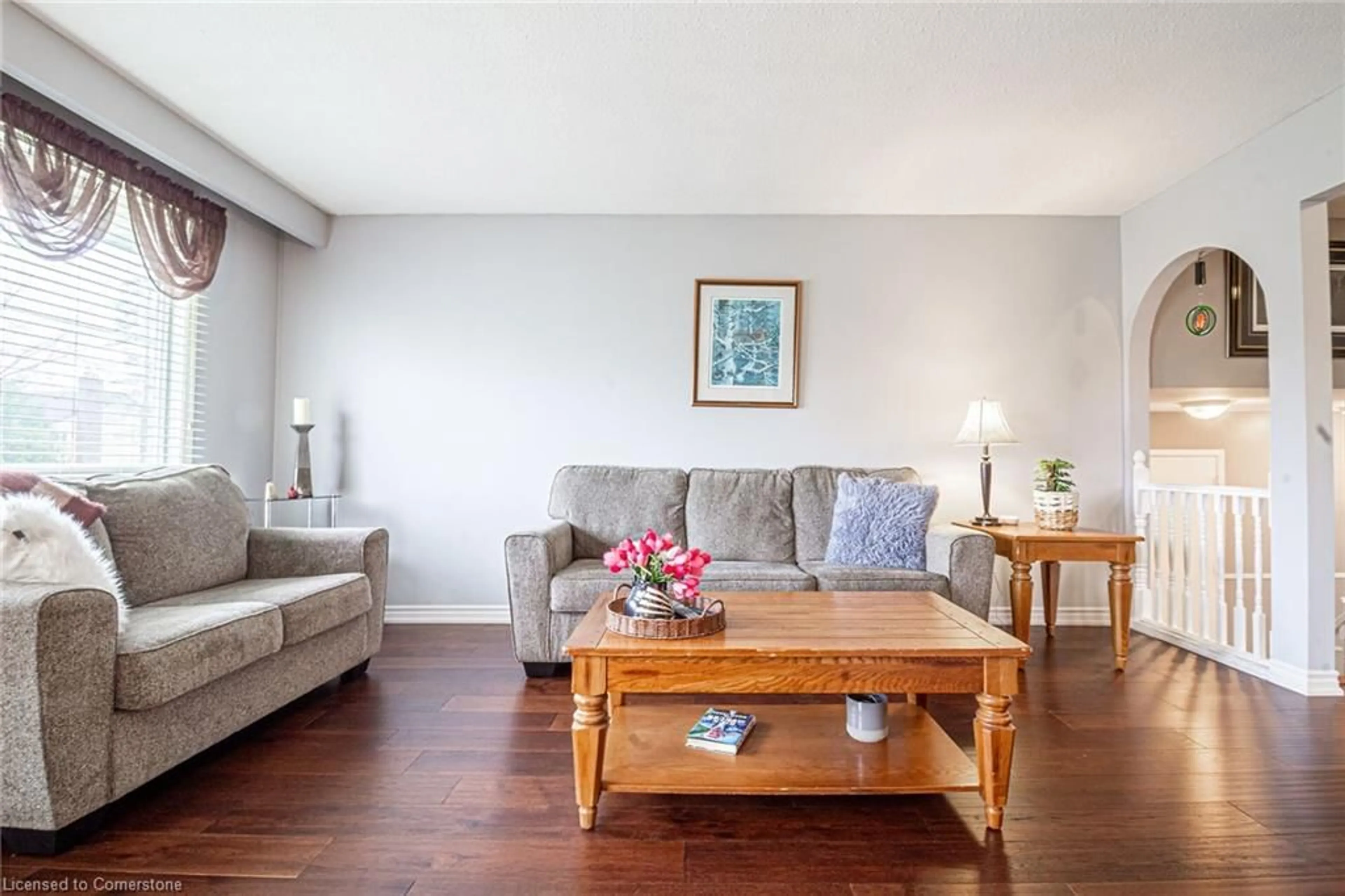 Living room with furniture, wood/laminate floor for 700 Woodview Rd, Burlington Ontario L7N 3A5