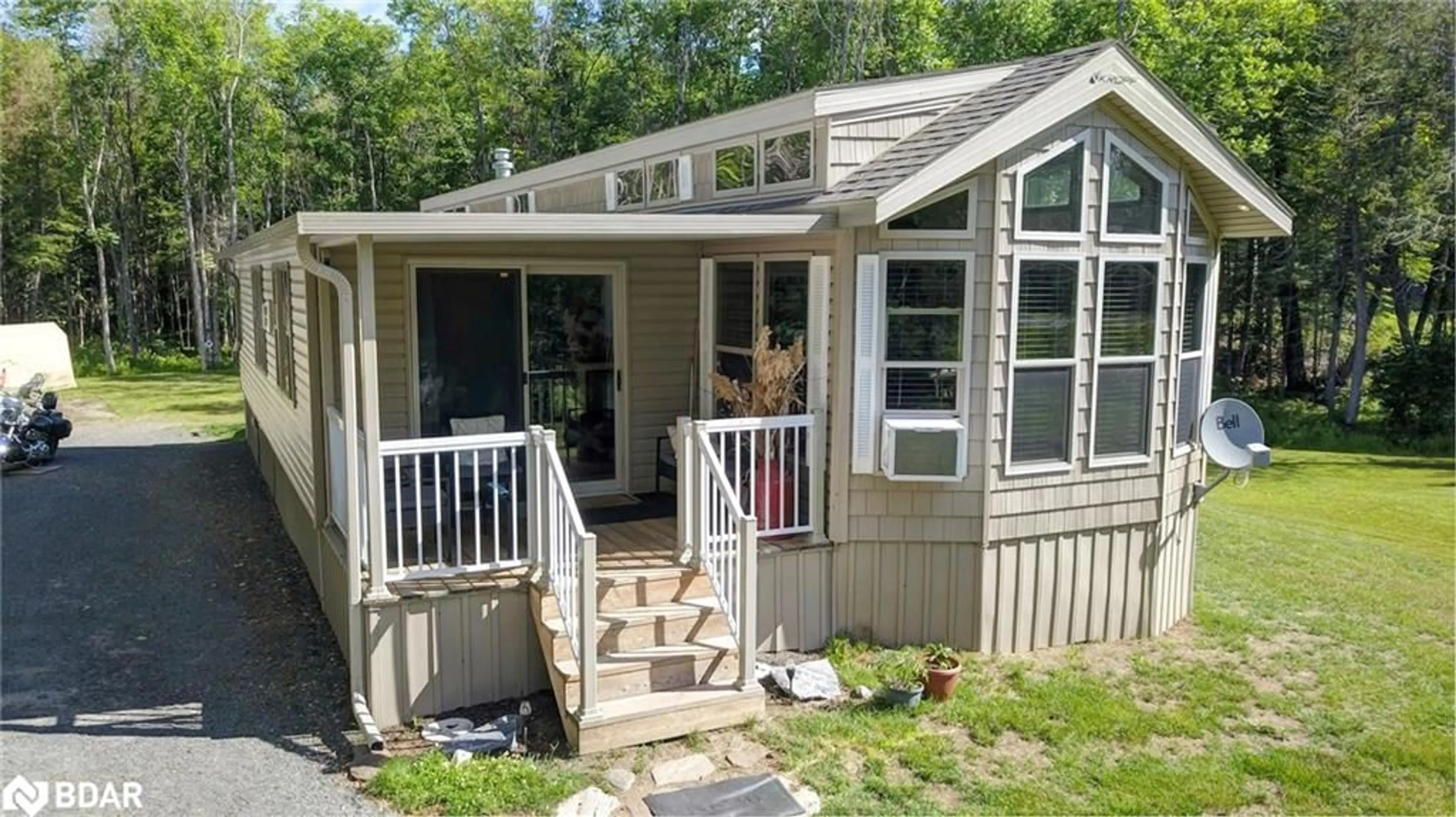 Home with vinyl exterior material, street for 1594 North Steenburg Lake Rd, Gilmour Ontario K0L 1P0