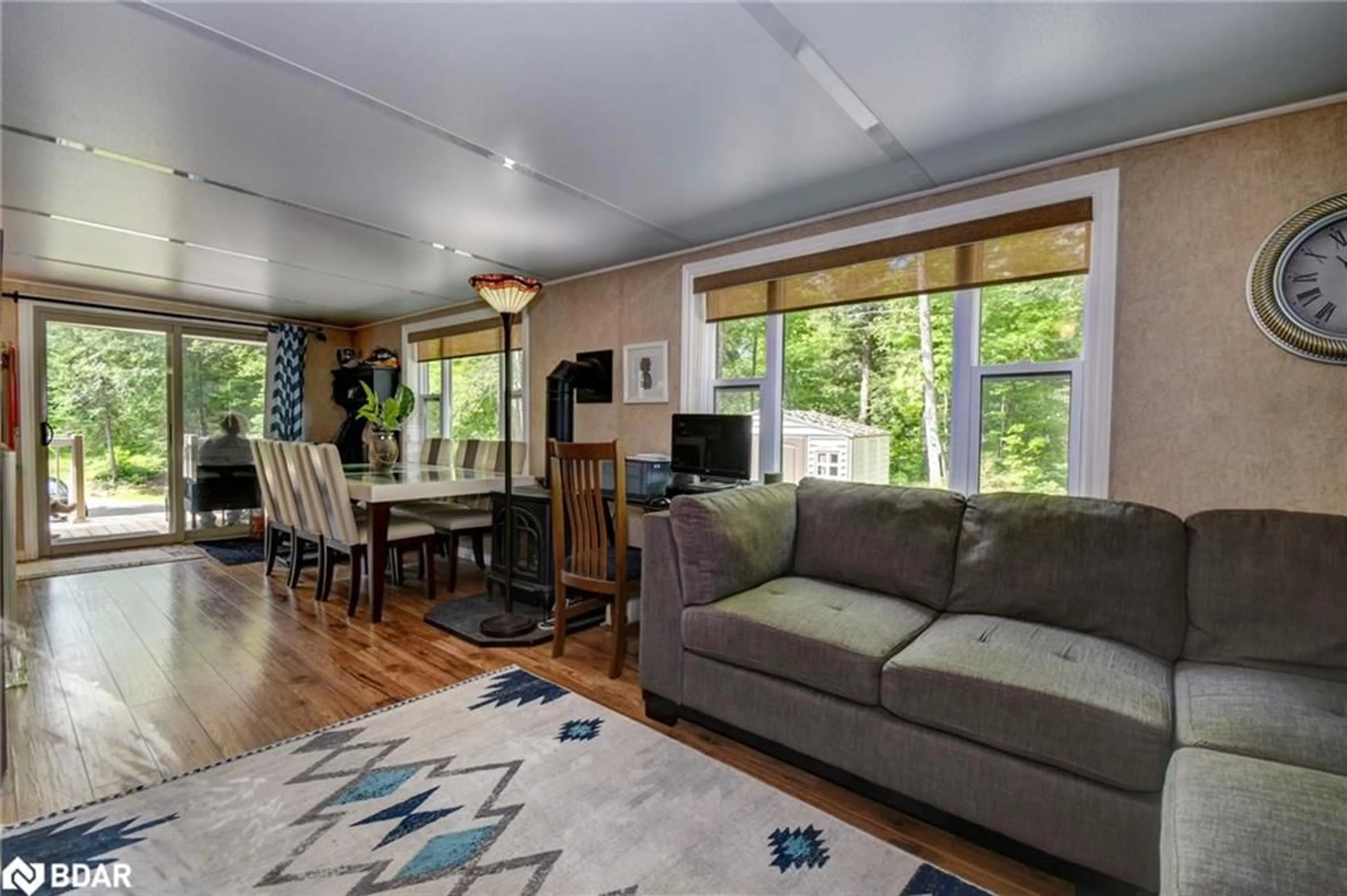 Living room with furniture, wood/laminate floor for 1594 North Steenburg Lake Rd, Gilmour Ontario K0L 1P0