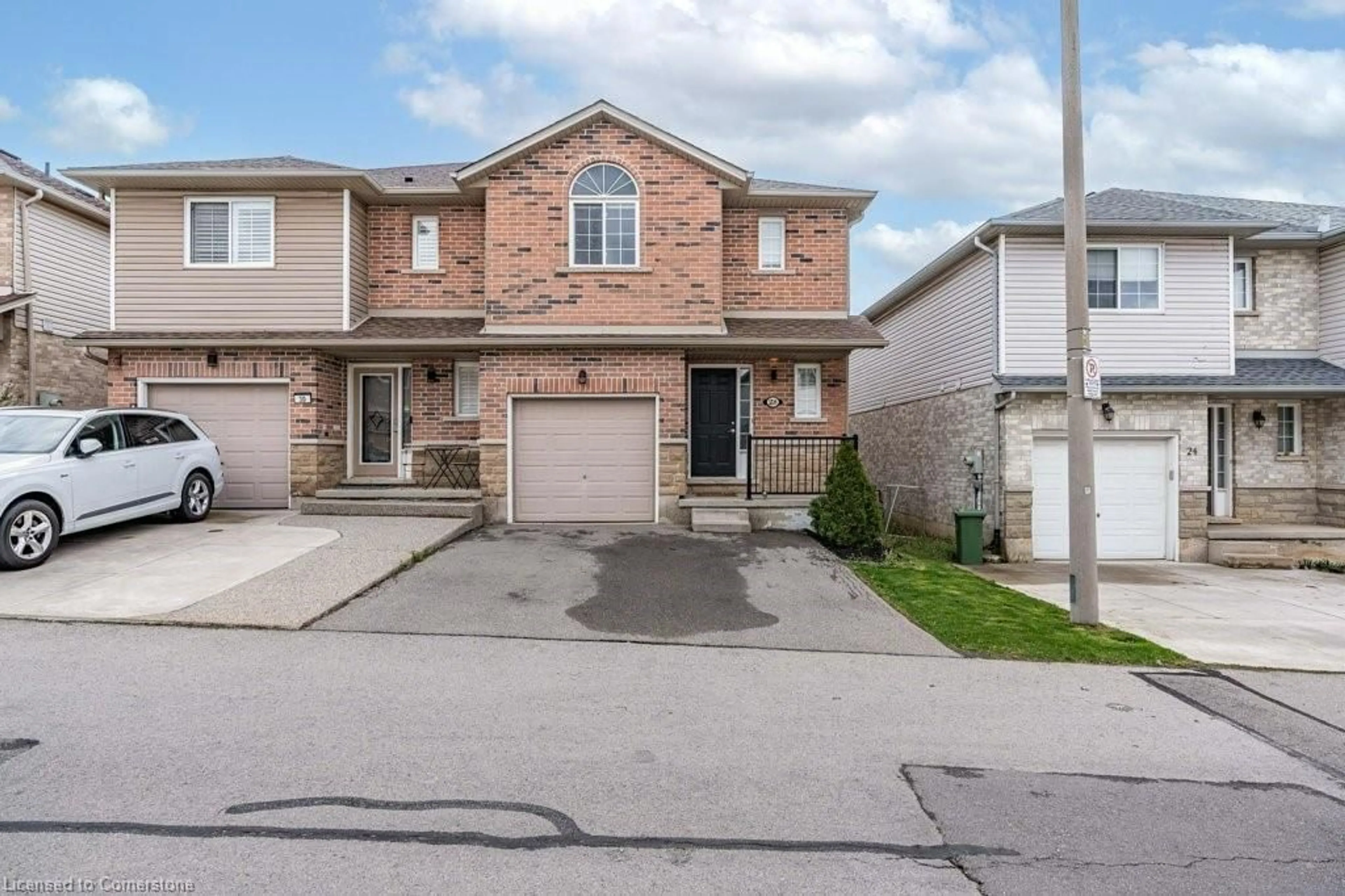 Home with brick exterior material, street for 28 Vennio Lane, Hamilton Ontario L9B 2Y7