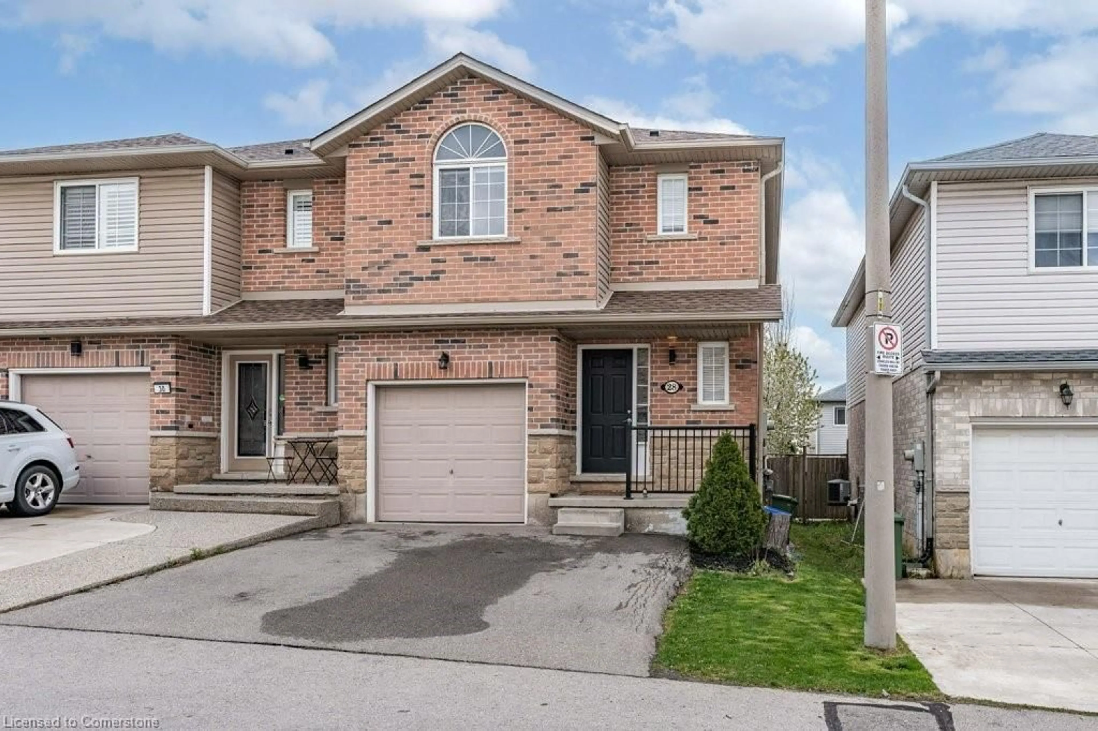 Home with brick exterior material, street for 28 Vennio Lane, Hamilton Ontario L9B 2Y7
