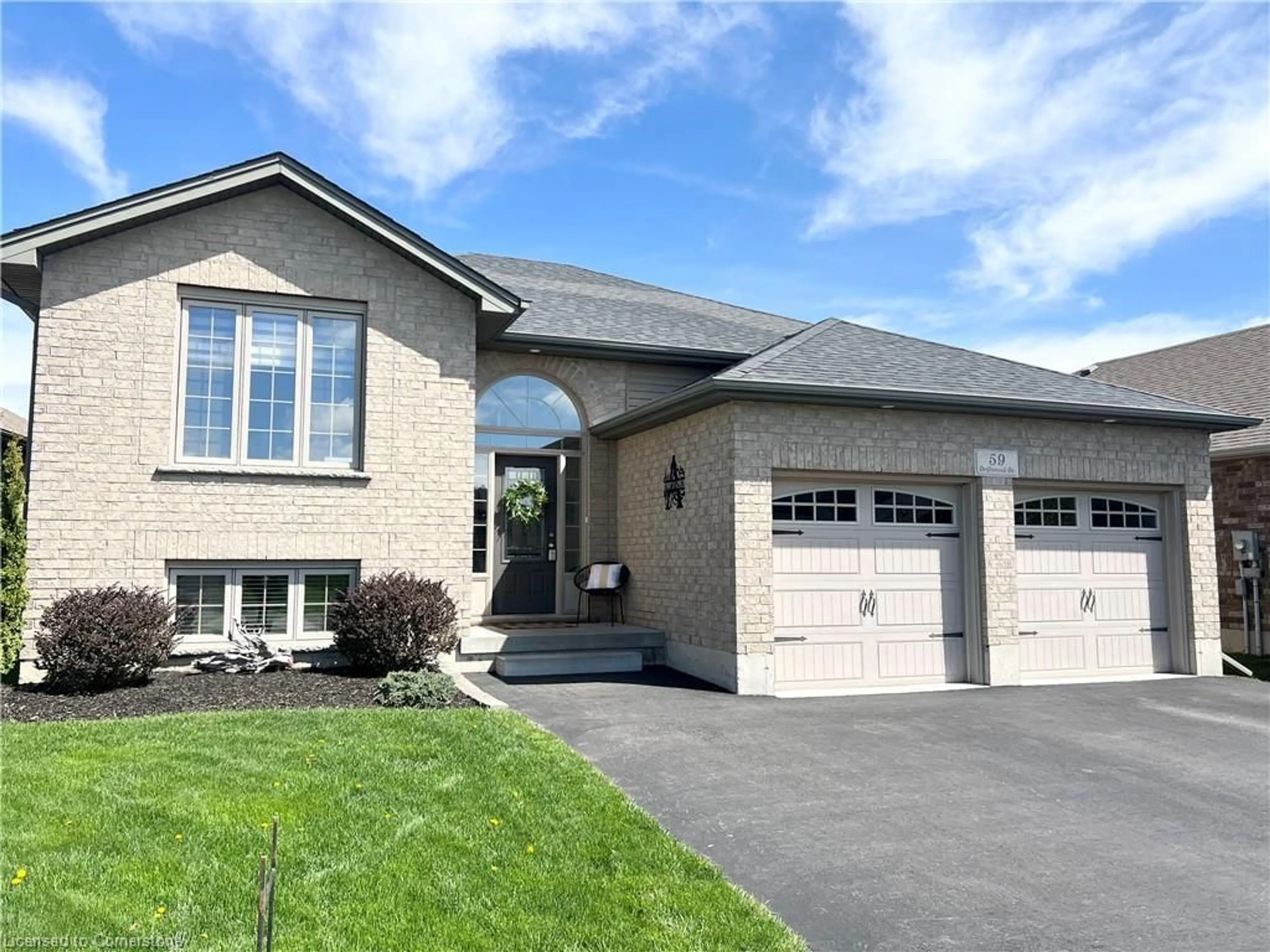 Home with brick exterior material, street for 59 Driftwood Dr, Simcoe Ontario N3Y 0A3