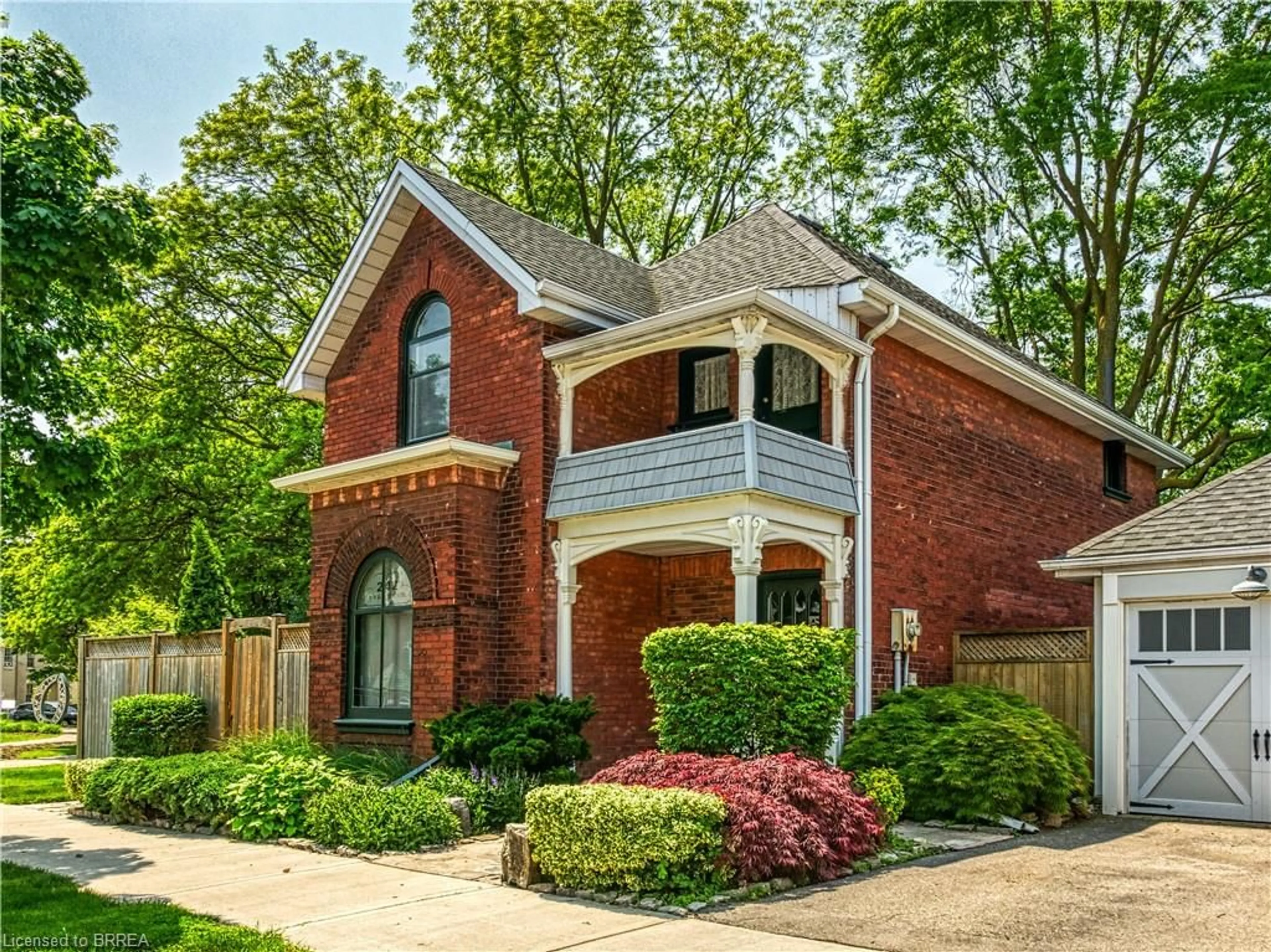 Home with brick exterior material, street for 242 Brant Ave, Brantford Ontario N3T 3J5