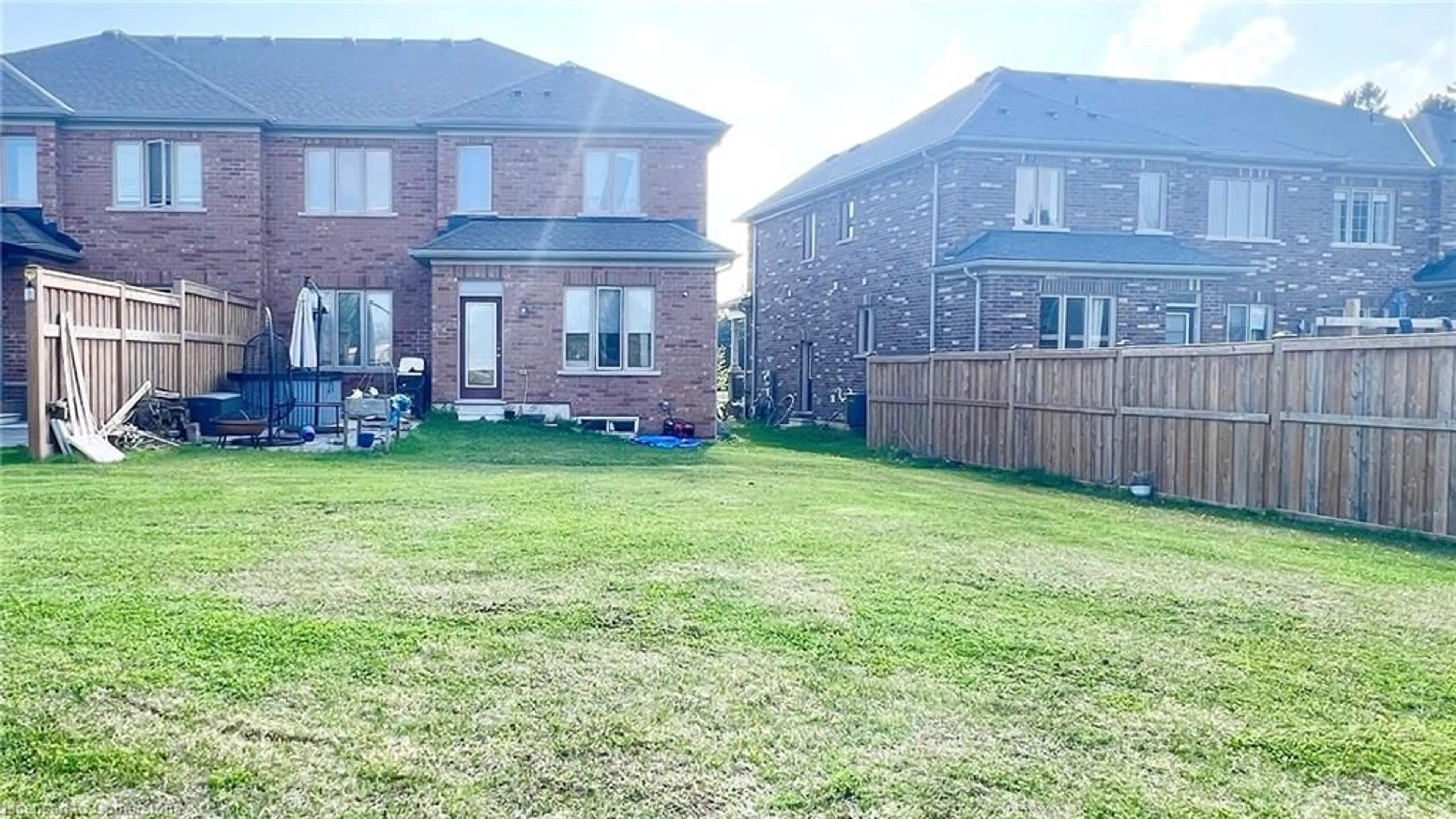 A pic from outside/outdoor area/front of a property/back of a property/a pic from drone, unknown for 61 Harvest Ave, Tillsonburg Ontario N4G 0H9
