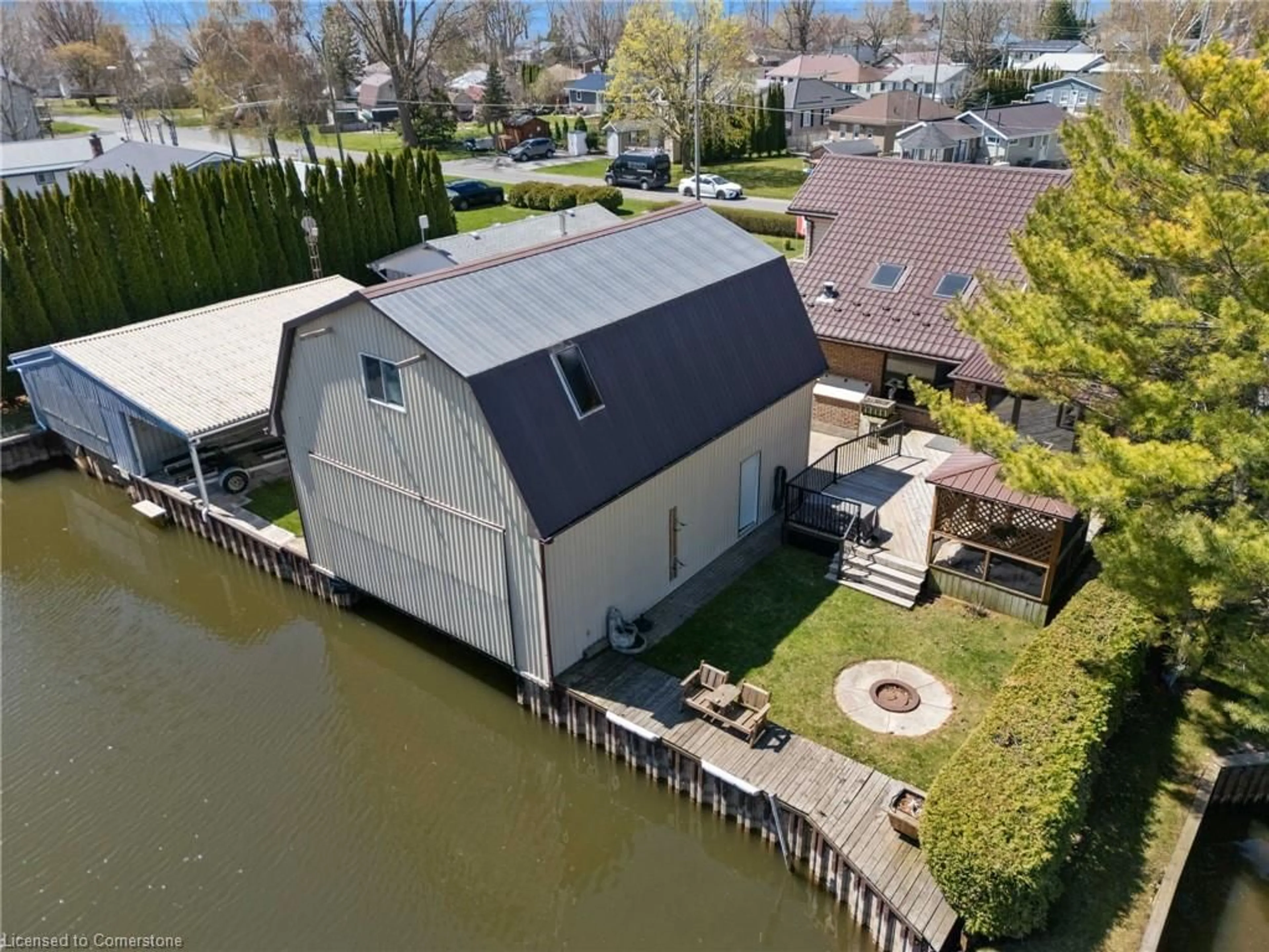 A pic from outside/outdoor area/front of a property/back of a property/a pic from drone, water/lake/river/ocean view for 23 Poplar Rd, Long Point Ontario N0E 1M0