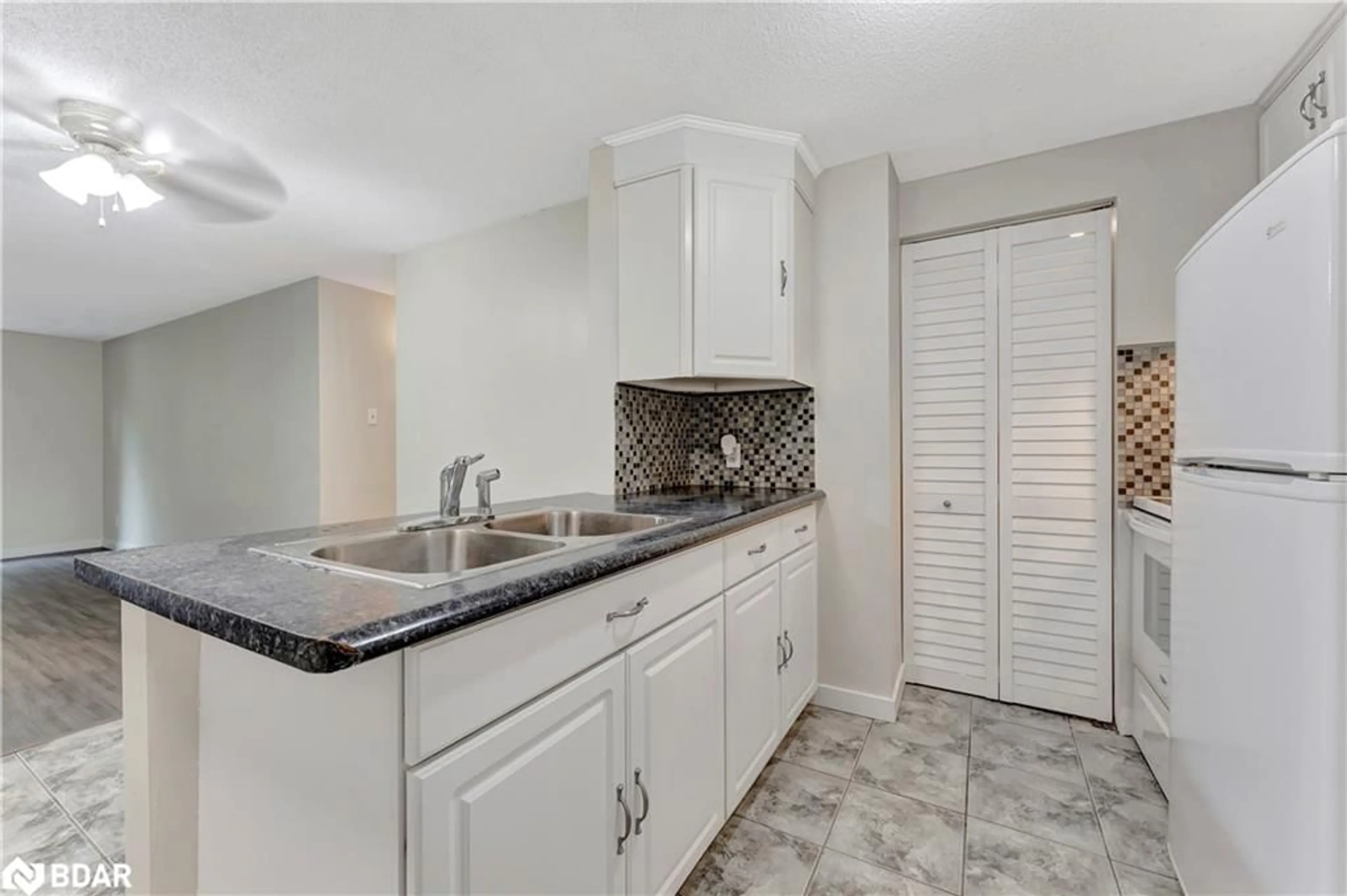 Standard kitchen, ceramic/tile floor for 30 Bridge St #206, Kitchener Ontario N2K 1K4
