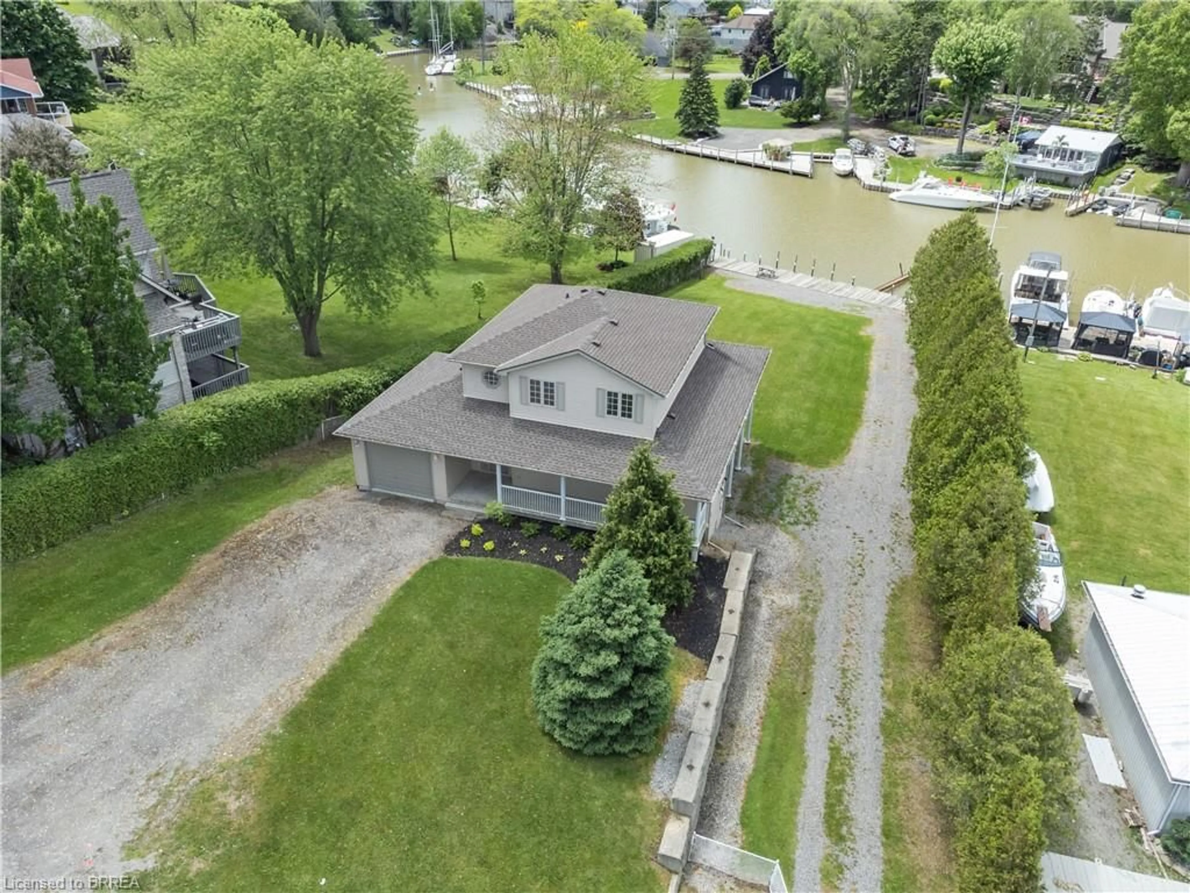 A pic from outside/outdoor area/front of a property/back of a property/a pic from drone, water/lake/river/ocean view for 5 Jaylin Cres, Port Dover Ontario N0A 1N7