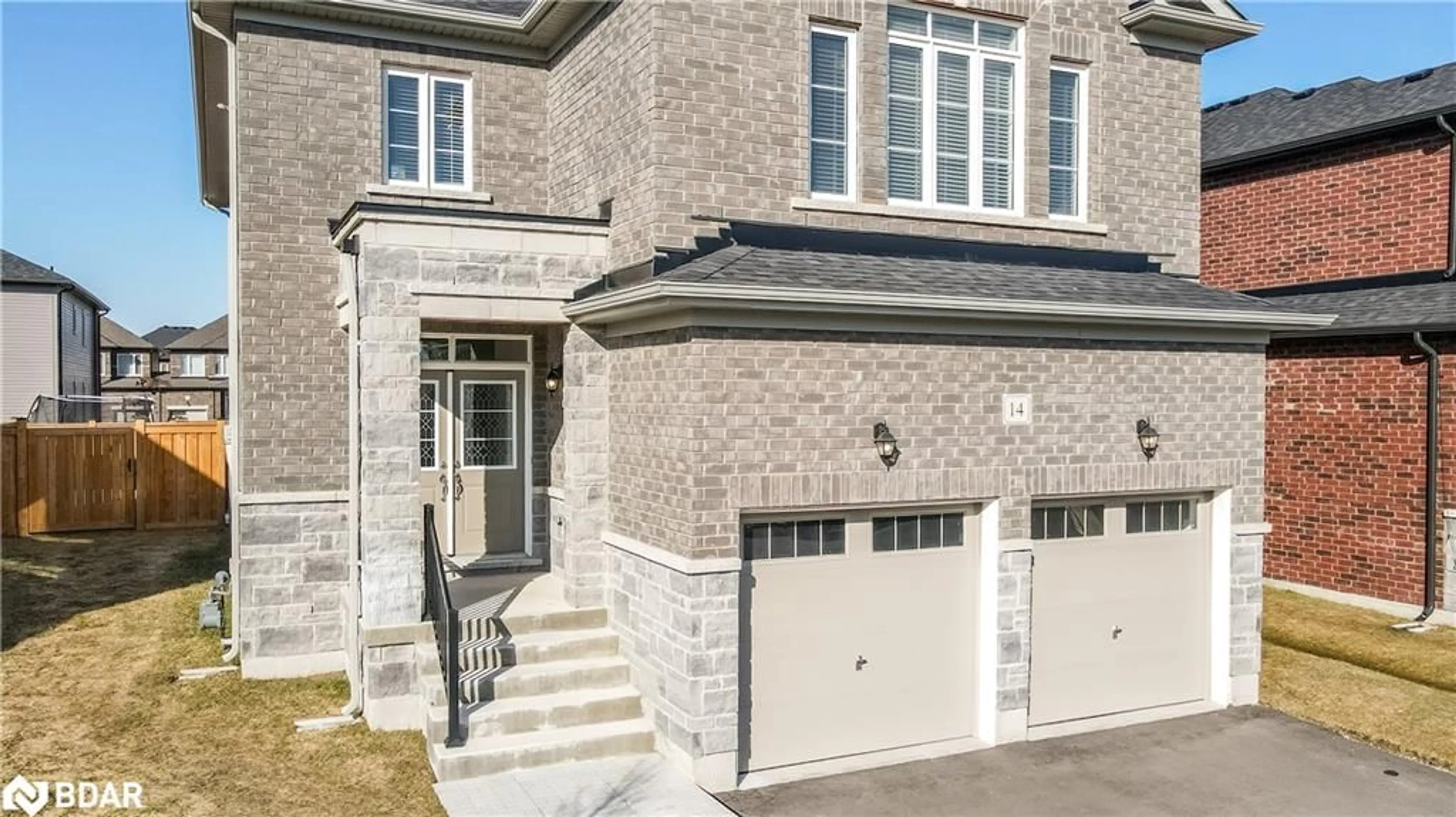Home with brick exterior material, street for 14 Emerald St, Wasaga Beach Ontario L9Z 0K8