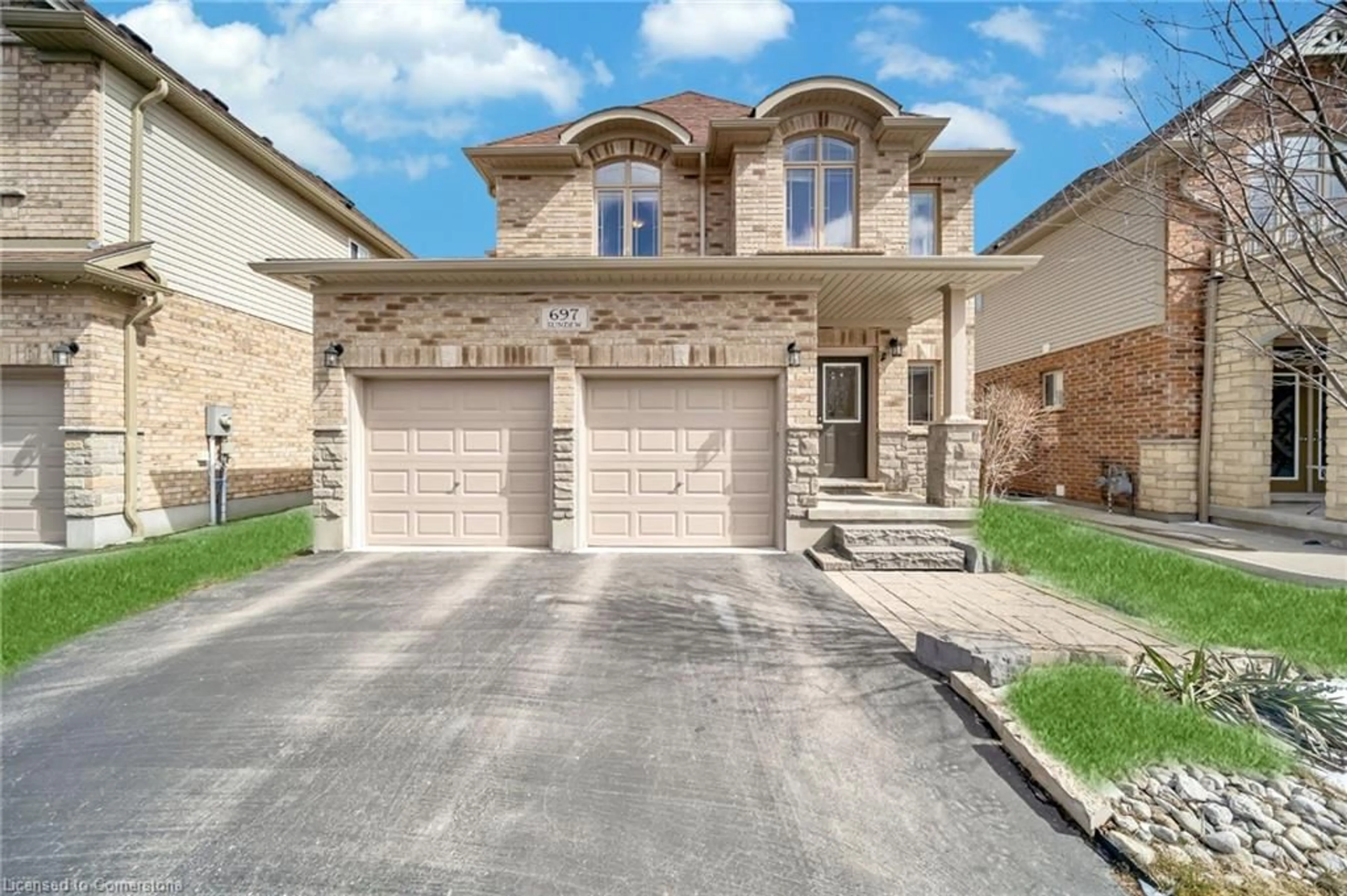 Home with brick exterior material, street for 697 Sundew Dr, Waterloo Ontario N2V 0E4