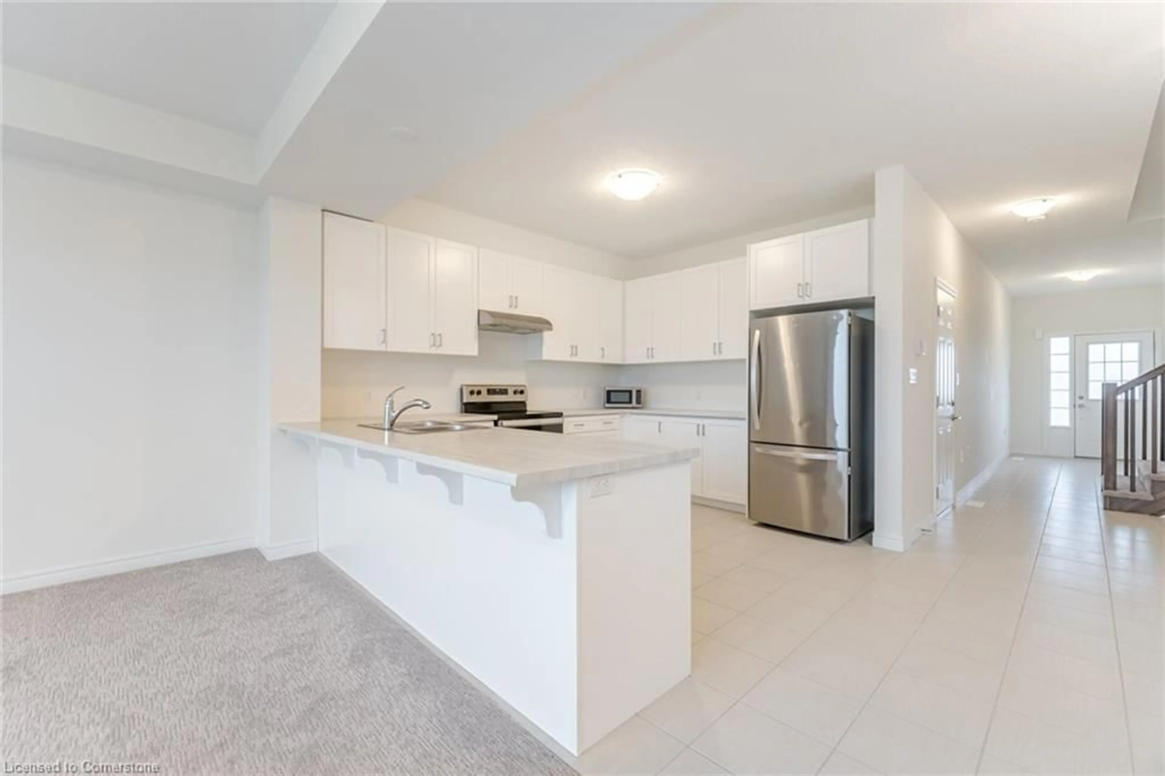 Open concept kitchen, ceramic/tile floor for 30 Zoe Lane Lane, Binbrook Ontario L0R 1C0