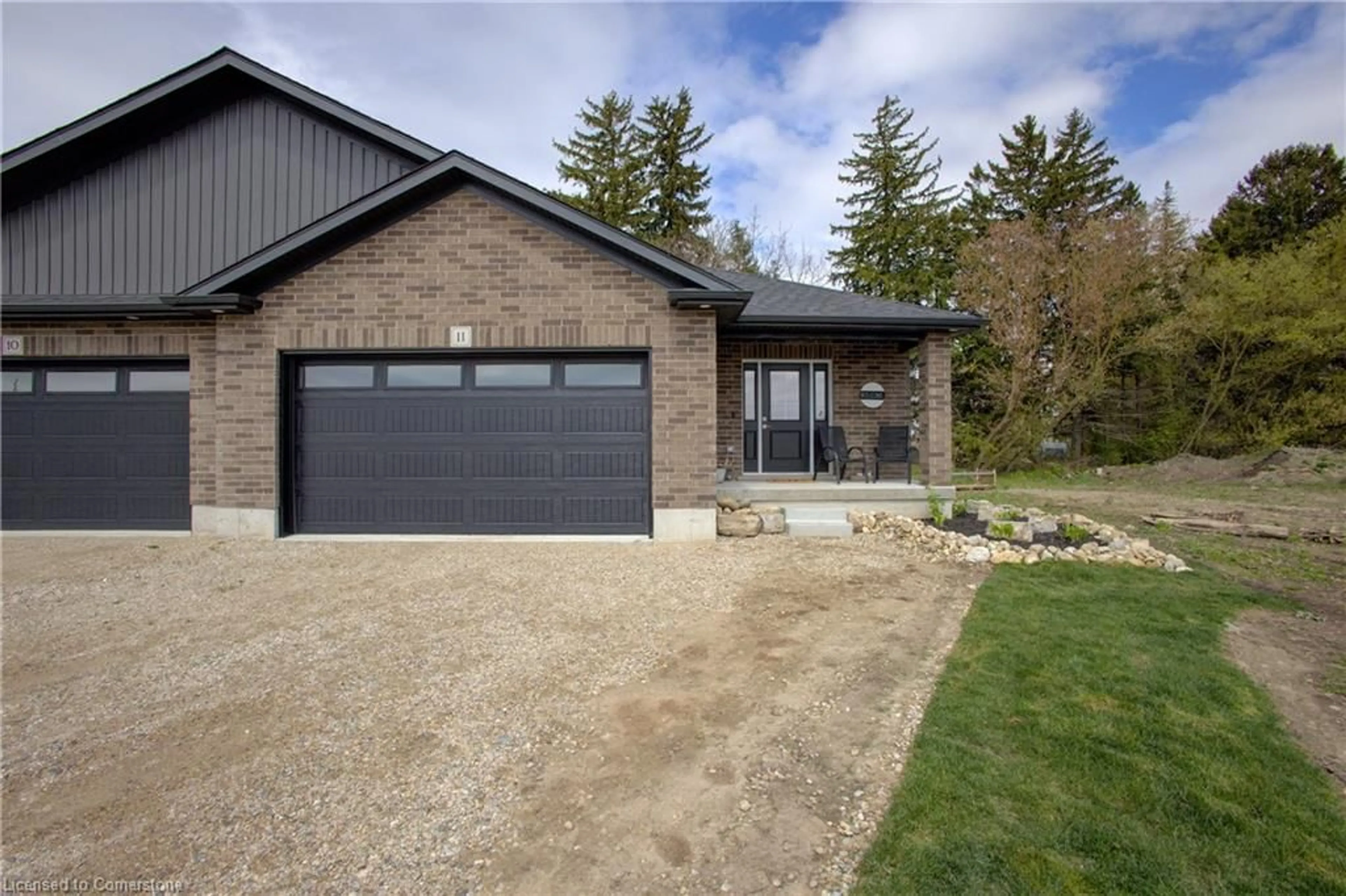 Home with brick exterior material, street for 11 Malcolm Crescent Cres, Listowel Ontario N4W 3X8