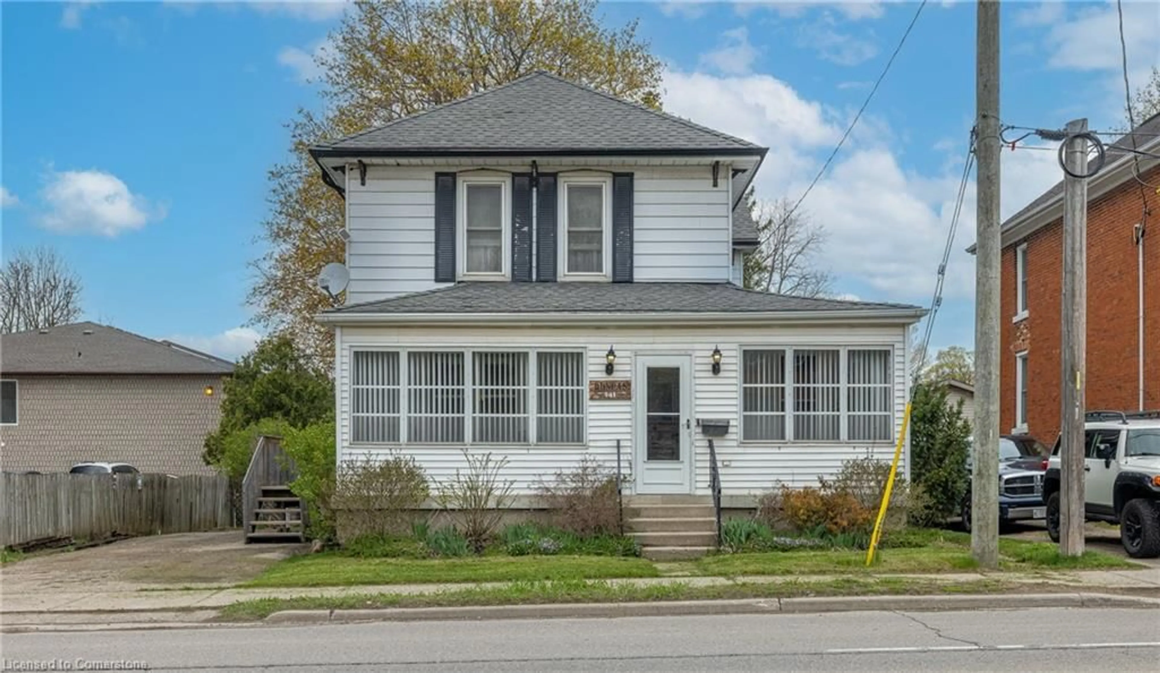 Home with vinyl exterior material, street for 141 Dundas St, Woodstock Ontario N4S 1A1