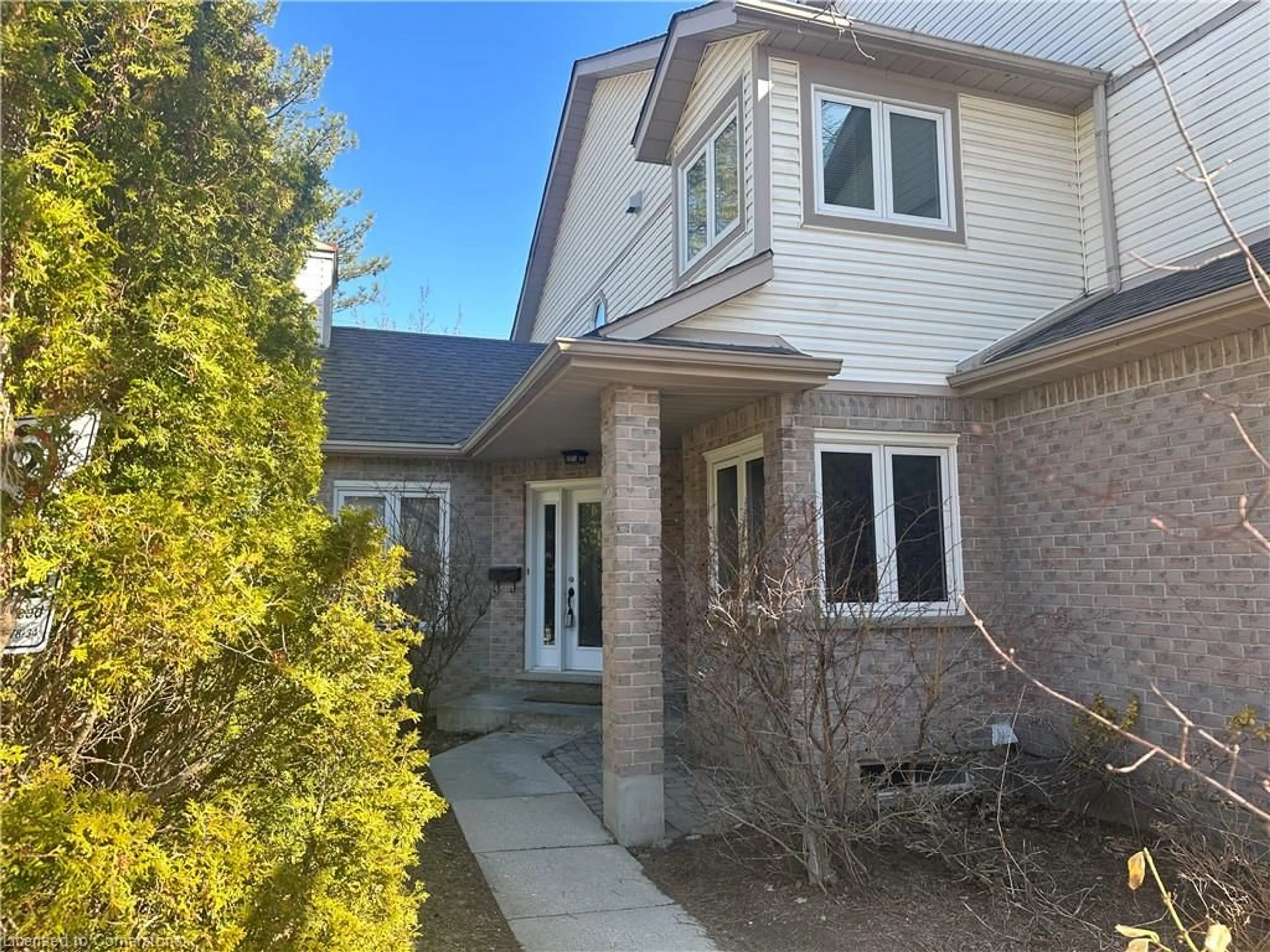 Home with brick exterior material, street for 365 Bennington Gate #30, Waterloo Ontario N2T 2L1